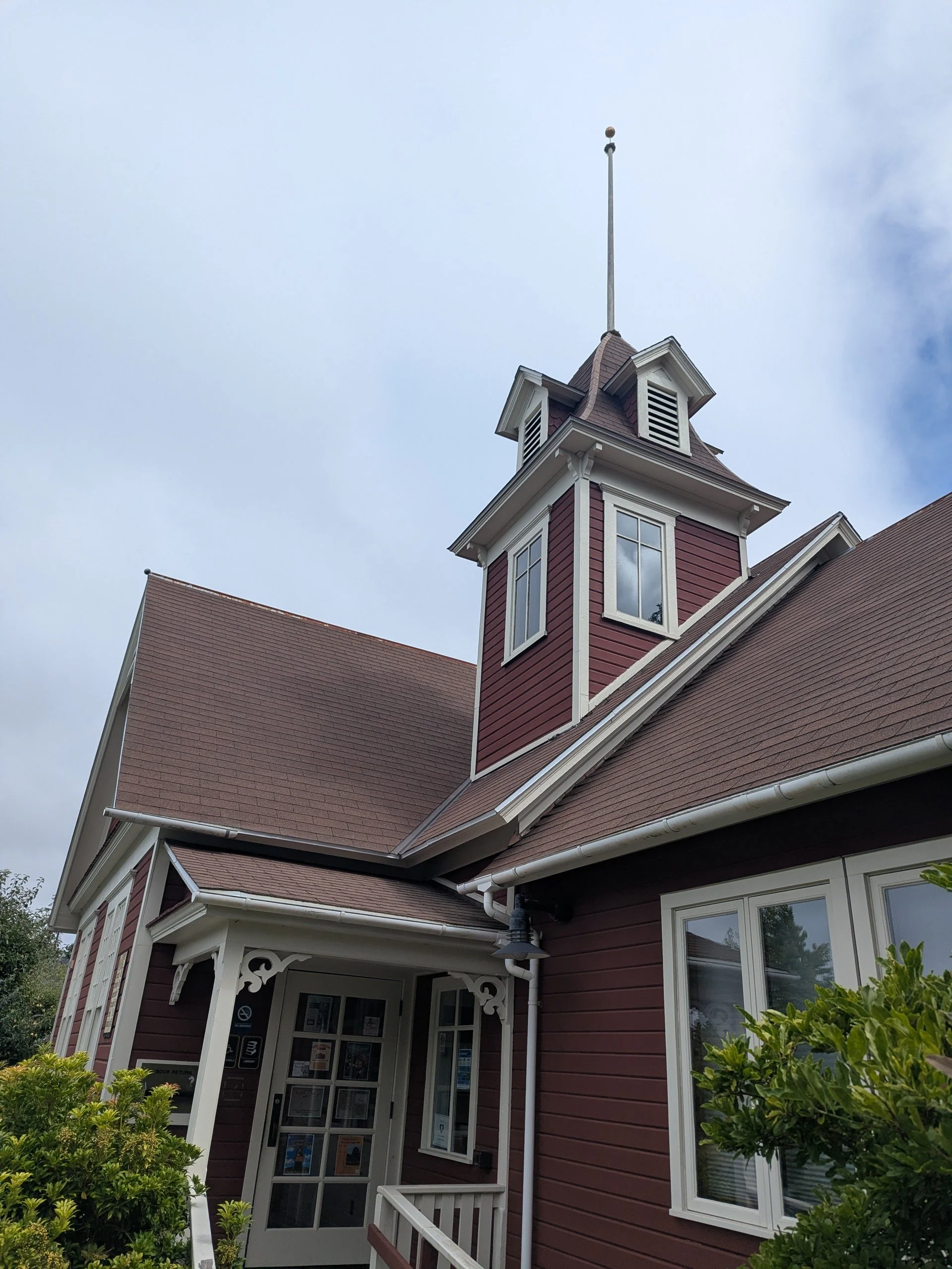 HKP has kicked off the Lopez Island Library Reroof project with a site visit to this beloved local institution.

HKP's Becca and Kelly soaked in the island sun while verifying existing conditions, reviewing roofing transitions, and assessing roof and