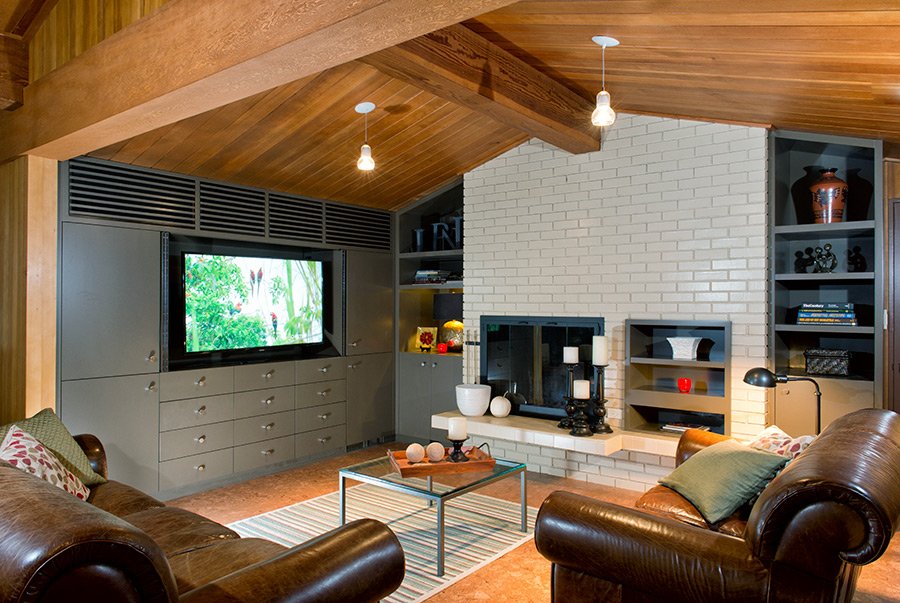Informal living room with leather furniture and fireplace