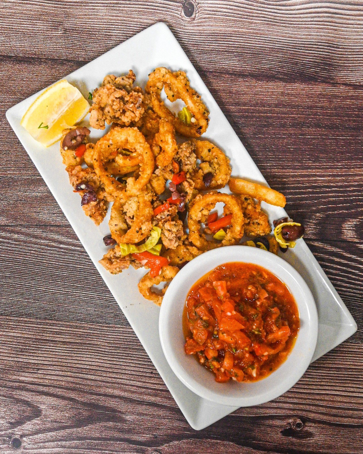 Dive into deliciousness with our crispy fried calamari! Perfectly golden and irresistibly tender, it's a taste of the sea you won't forget! 🦑

👉 We're open today 11am-9pm!
👉 Order online using the link in our bio!

#IkesRestaurant #SterlingHeights