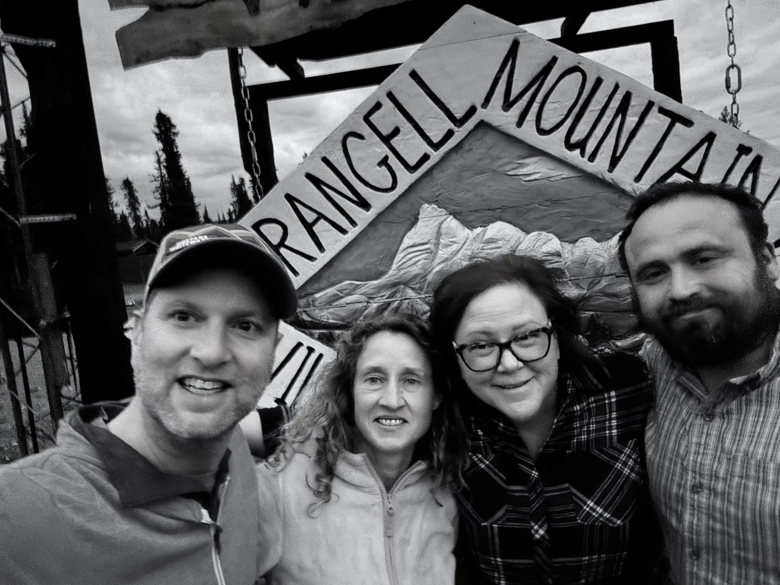 Guests In Front of Sign.jpeg