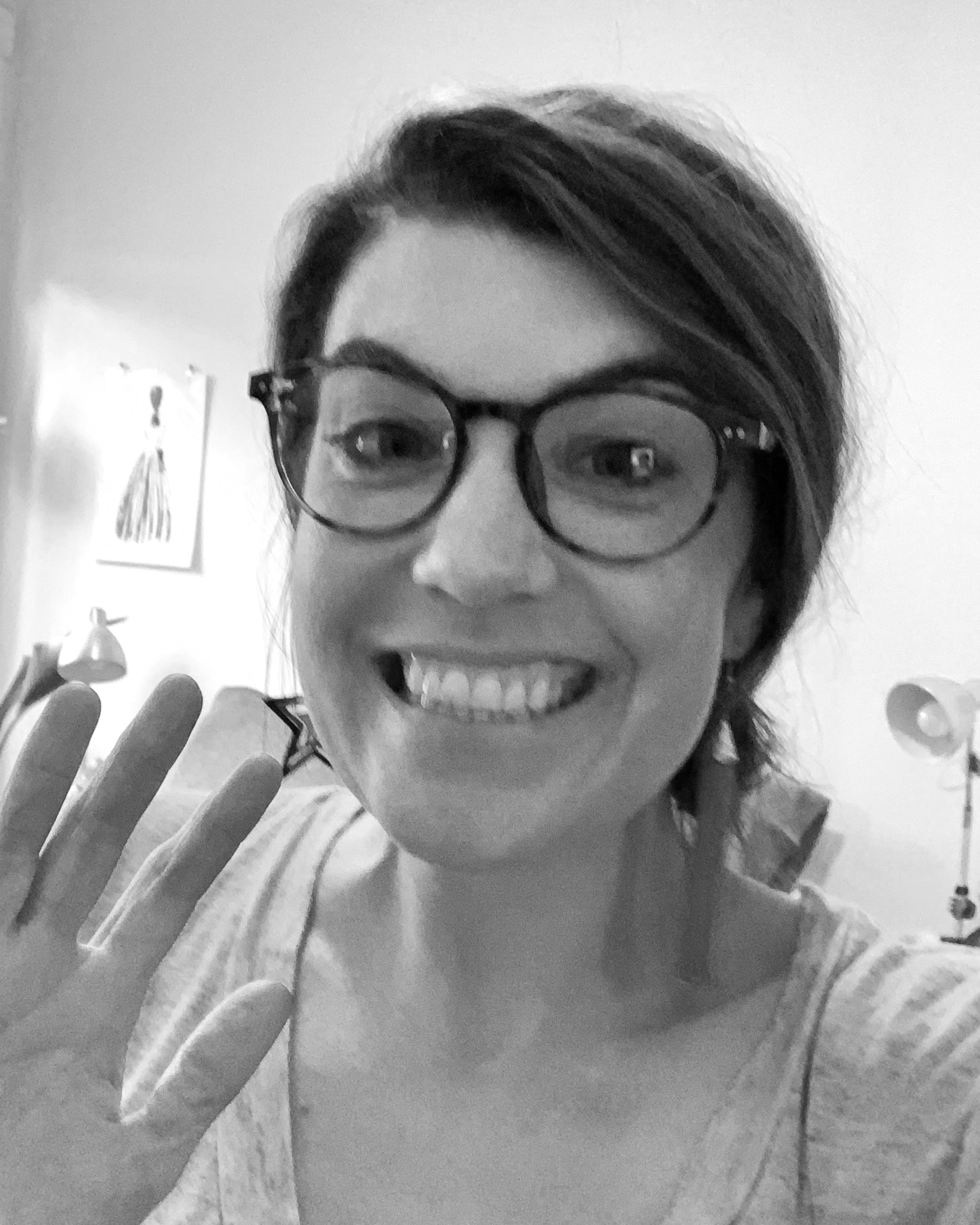 Lindsey in black and white waving