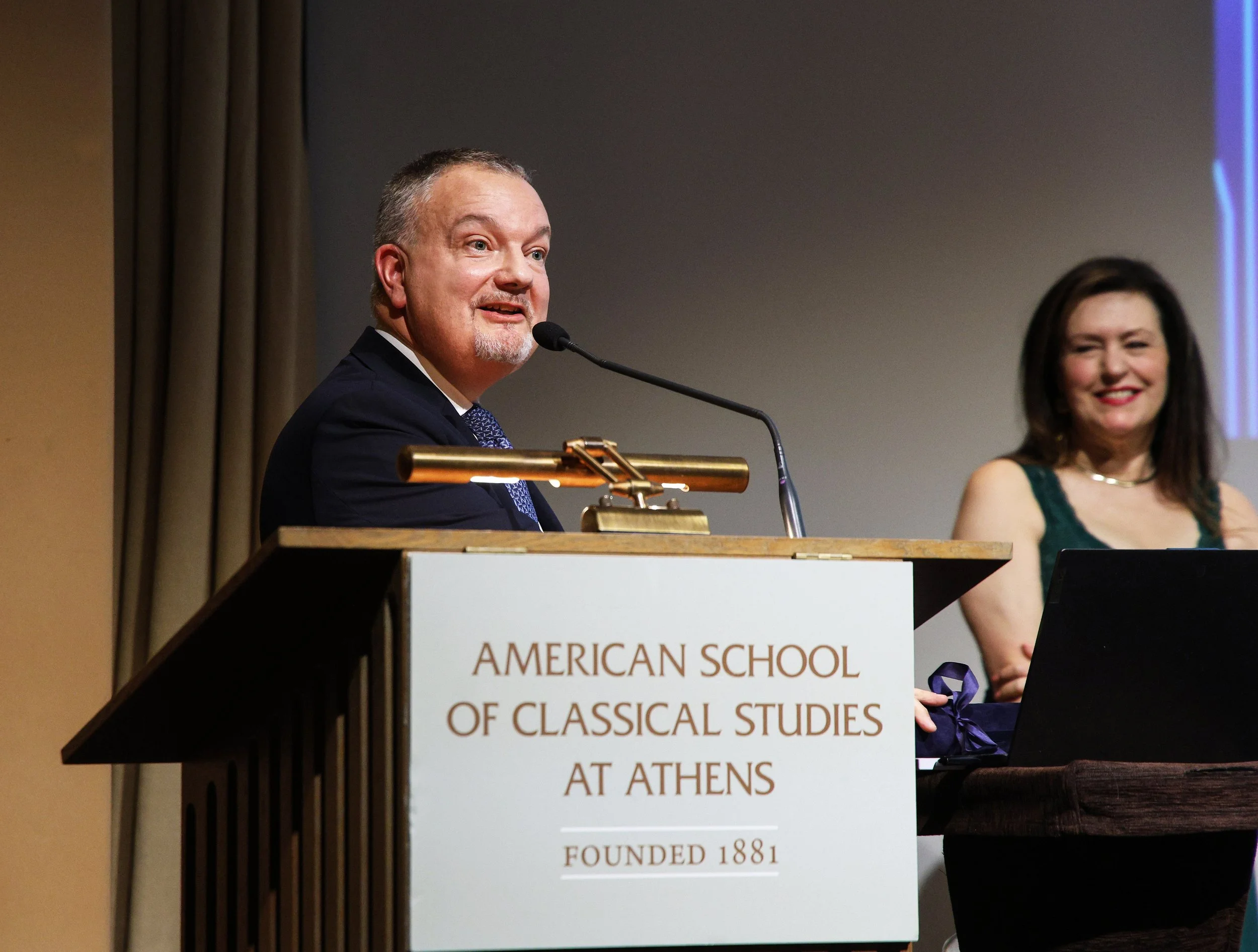 Edith receiving the prize from Matthew Lodge
