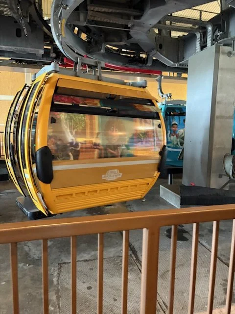 yellow disney skyliner gondola