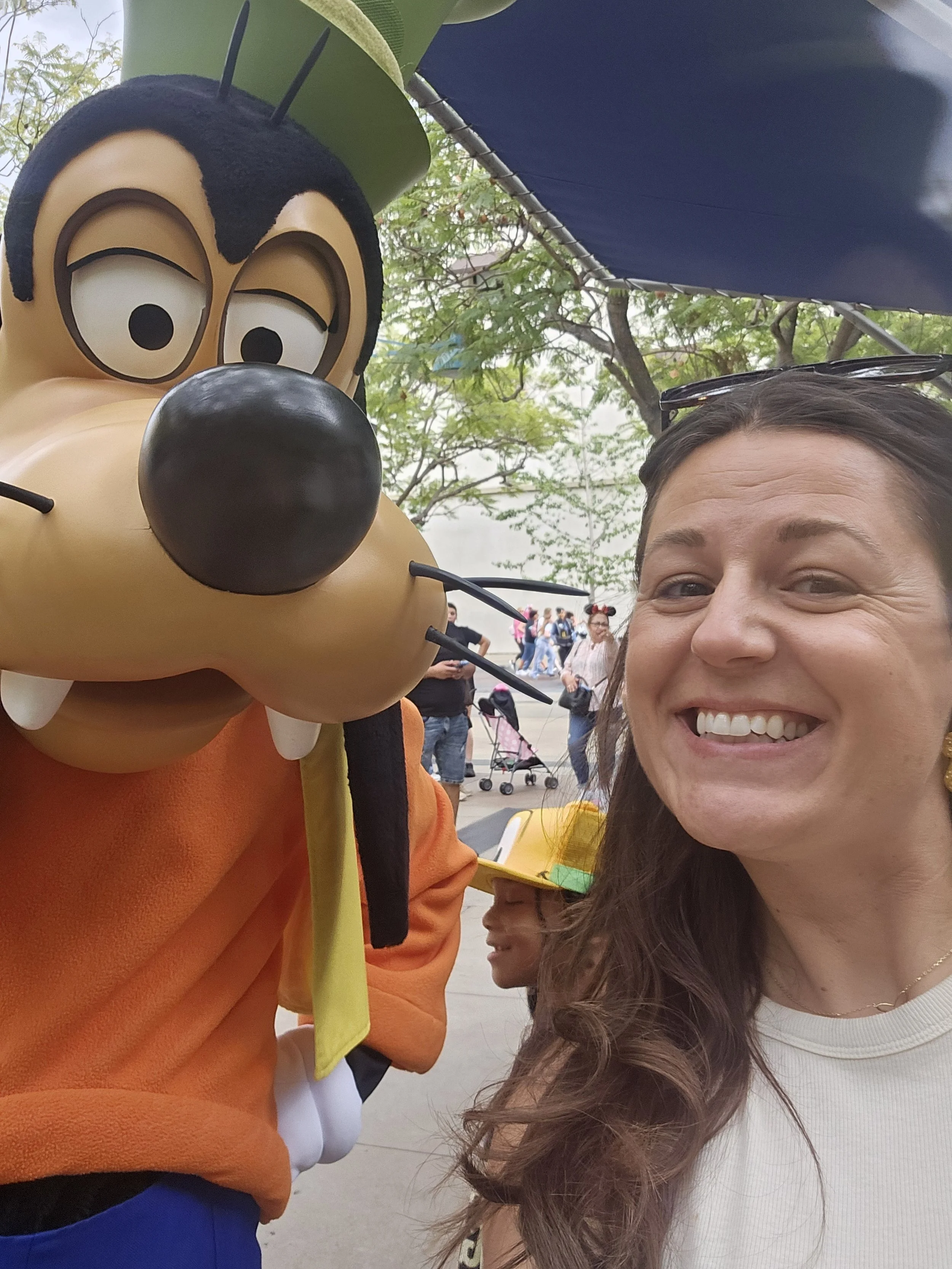 a woman smiling with goofy