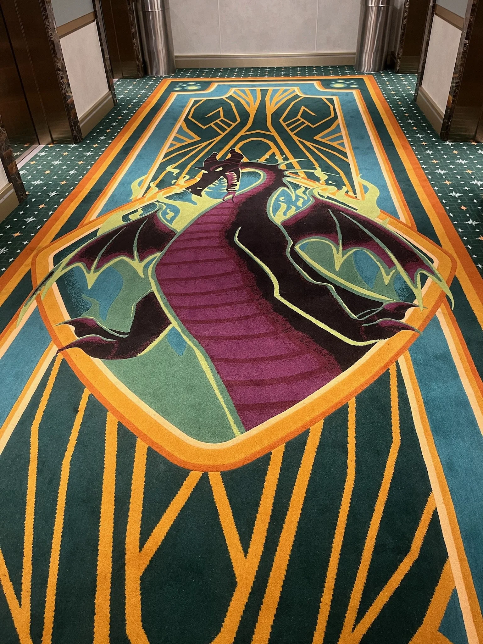 a carpet that has an image of a dragon on it