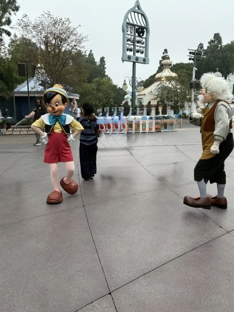 characters roaming the streets at Disneyland