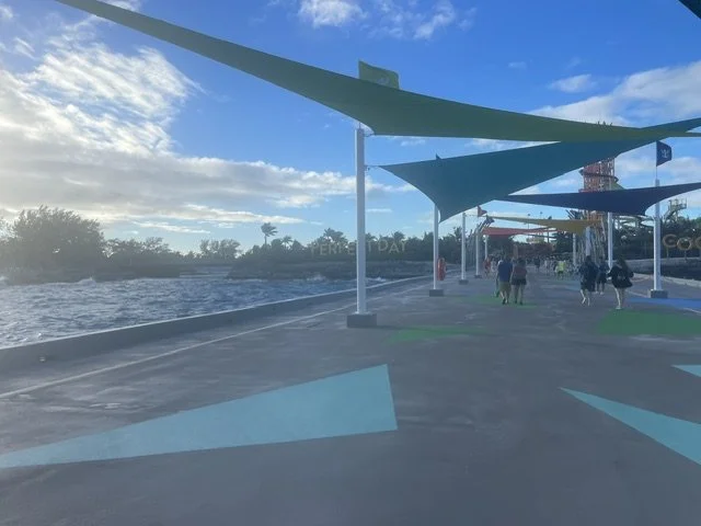 Shaded walkway leading toward the beach at Perfect Day at CocoCay, Royal Caribbean's private island stop.
