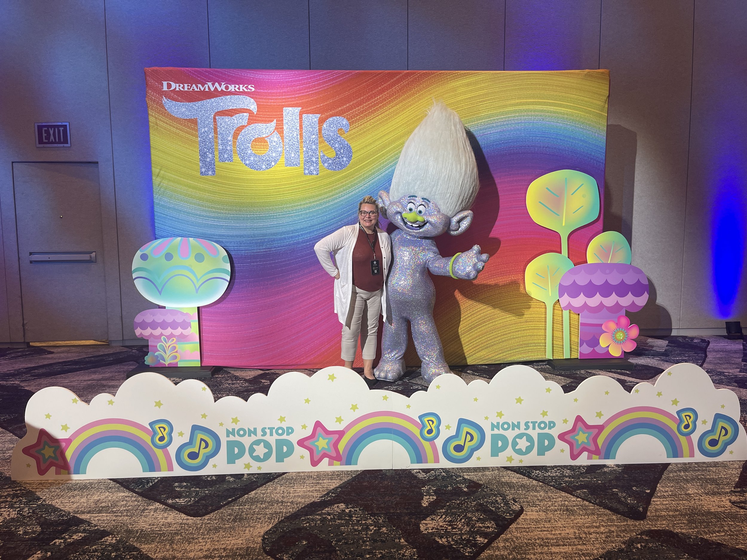 a woman a glittery life size troll