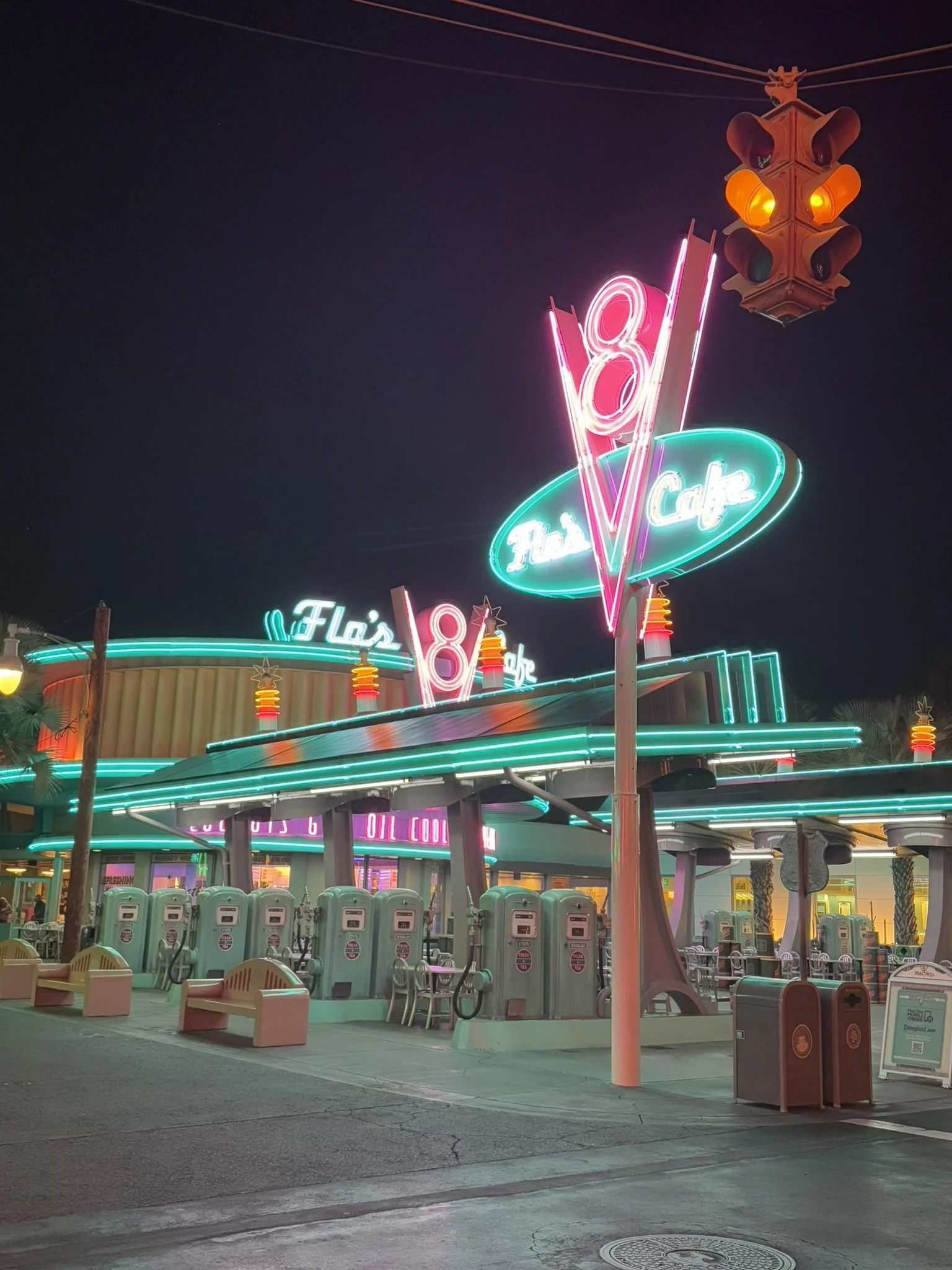 flo's cafe neon lit building exterior