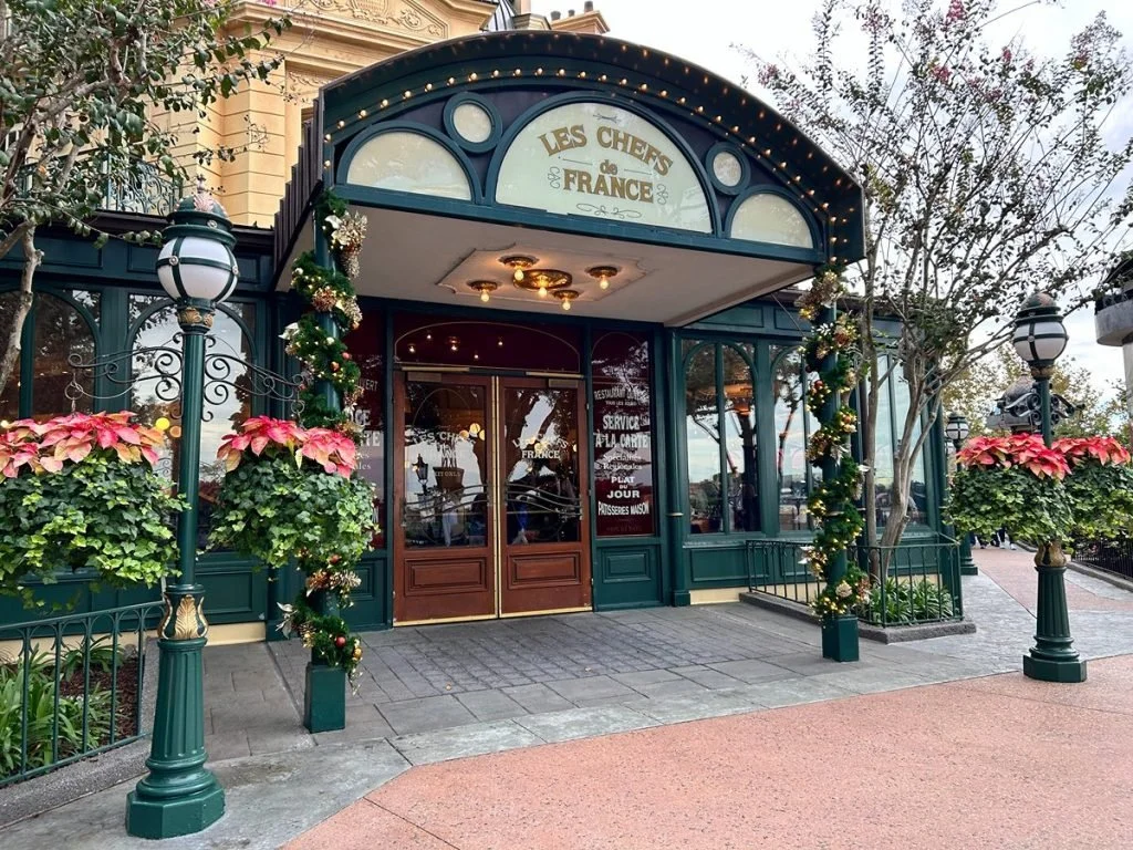 les chefs de france - green building exterior with large windows and greenery
