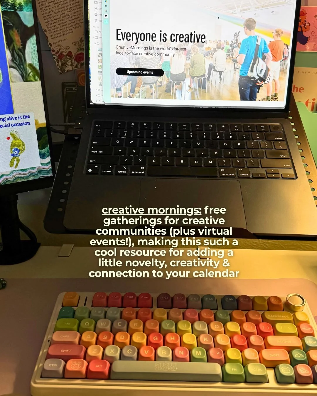 Laptop open to the CreativeMornings website above a colorful keyboard