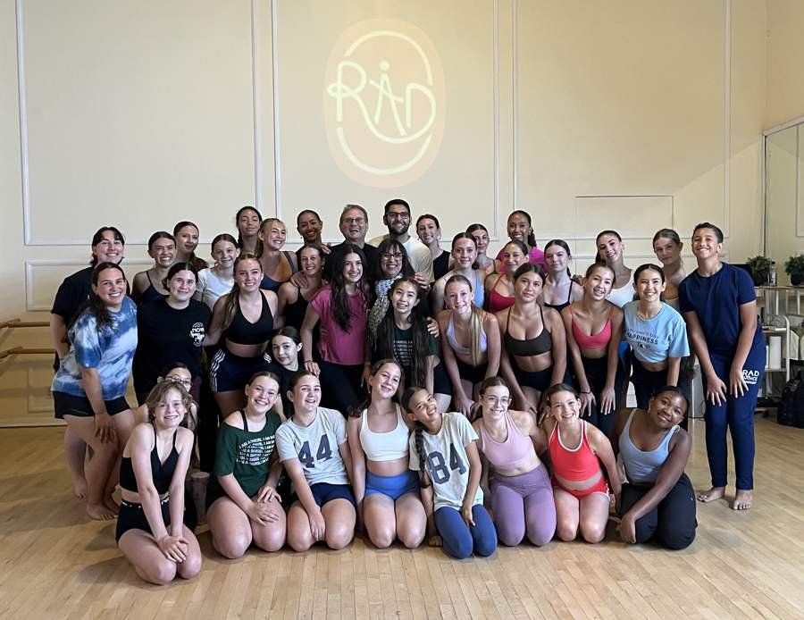 Darryl and Linda Retter surrounded by RAD Dance Company dancers in the studio