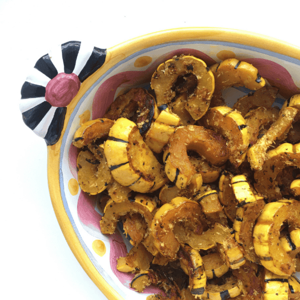 A bowl of warm delicata squash with curry.