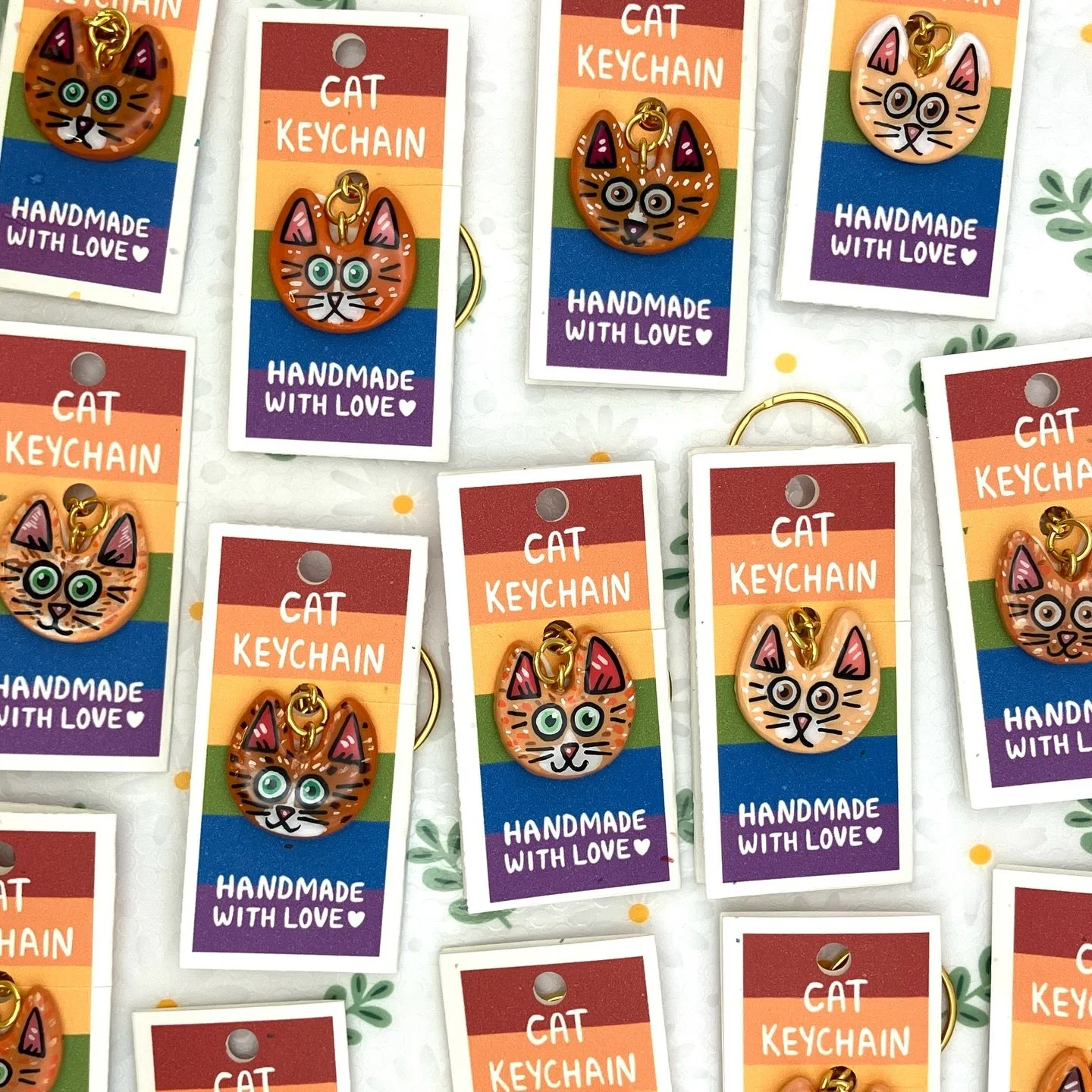 I took some lovely keychain photos for my Etsy shop. 🐈&zwj;⬛🐈 Which color combo do you like best? Do any of these keychains match your own cat?