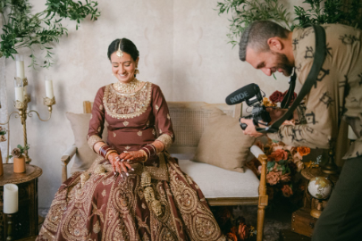 Vancouver wedding photographer and videographer working together during couple portraits