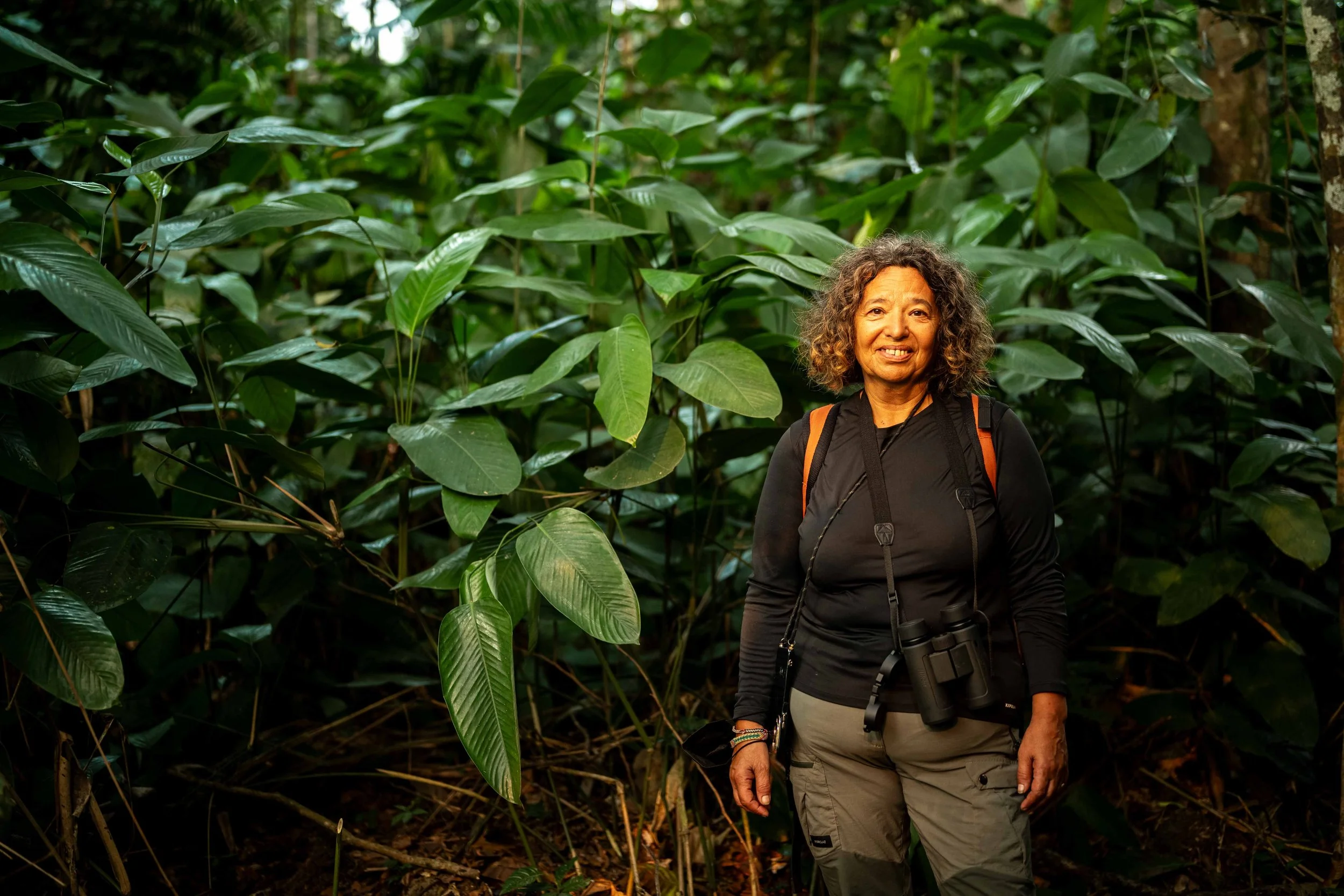 Laurence Glasberg, 57, observes nature in the Mbou Mon Tour reserve, Mai-Ndombe, Democratic Republic of Congo, August 2025.