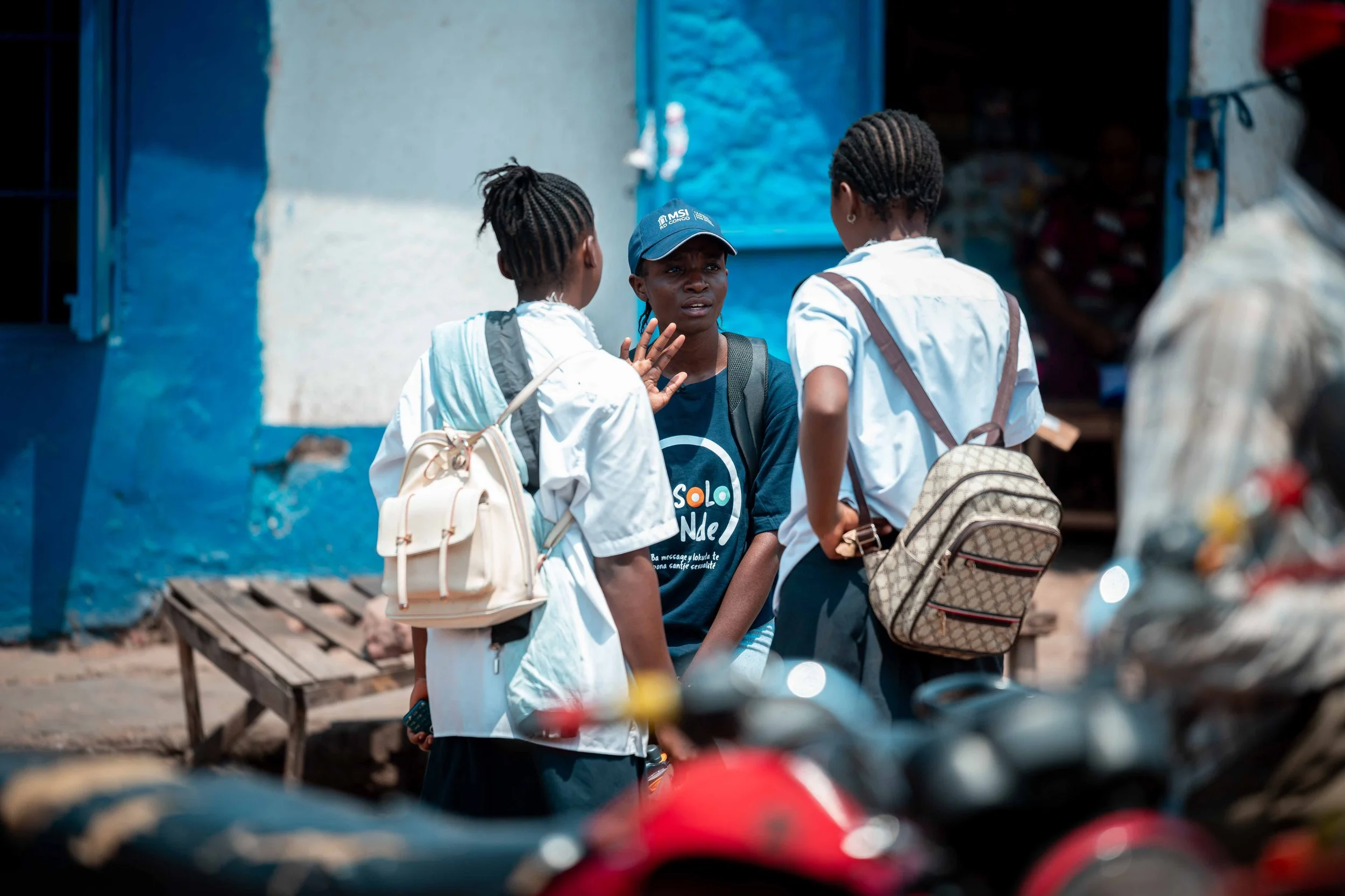 Thérèse Kiluba, MSI Big Sister, conducting clients outreach in the streets of Kalemie, Tanganyika, DRC. 