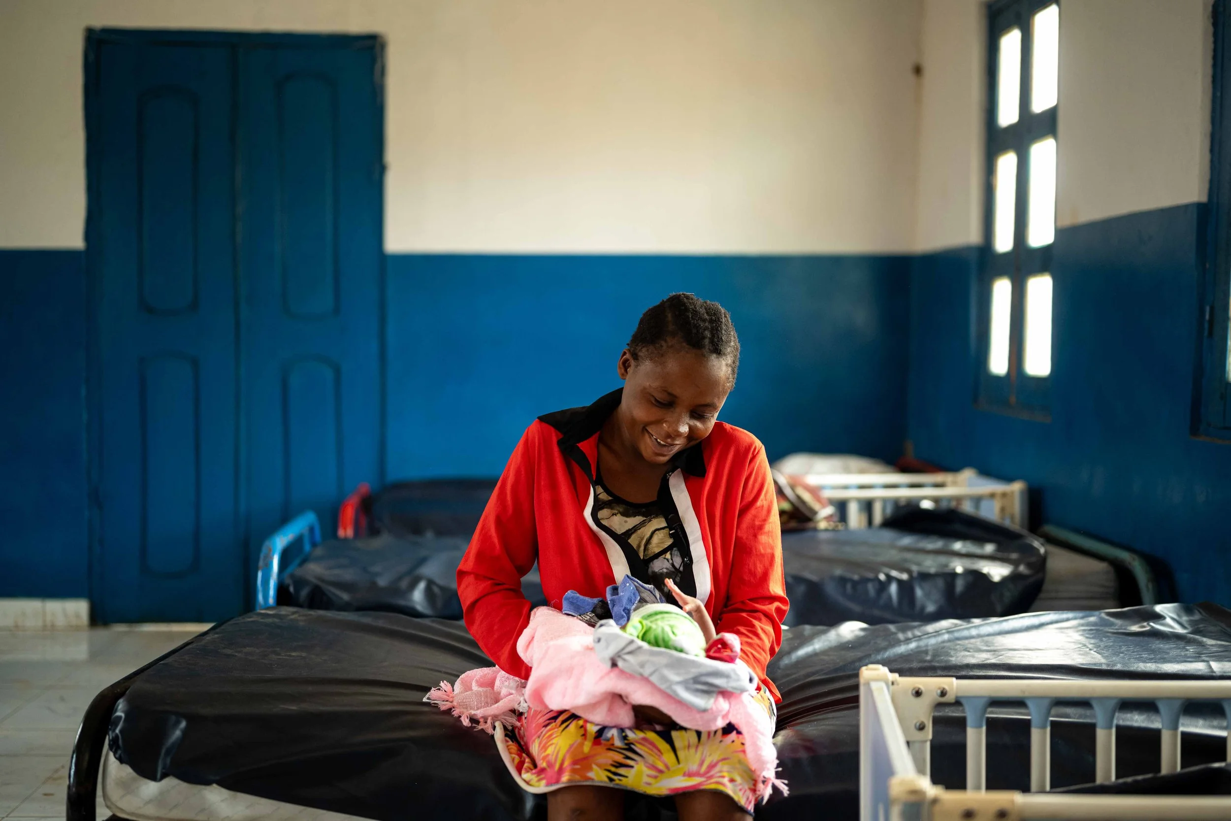 Portrait of Augustine Etomoni, 21, who gave birth at the maternity clinic built by Mbou Mon Tour, Mai-Ndombe, Democratic Republic of Congo, August 2025.