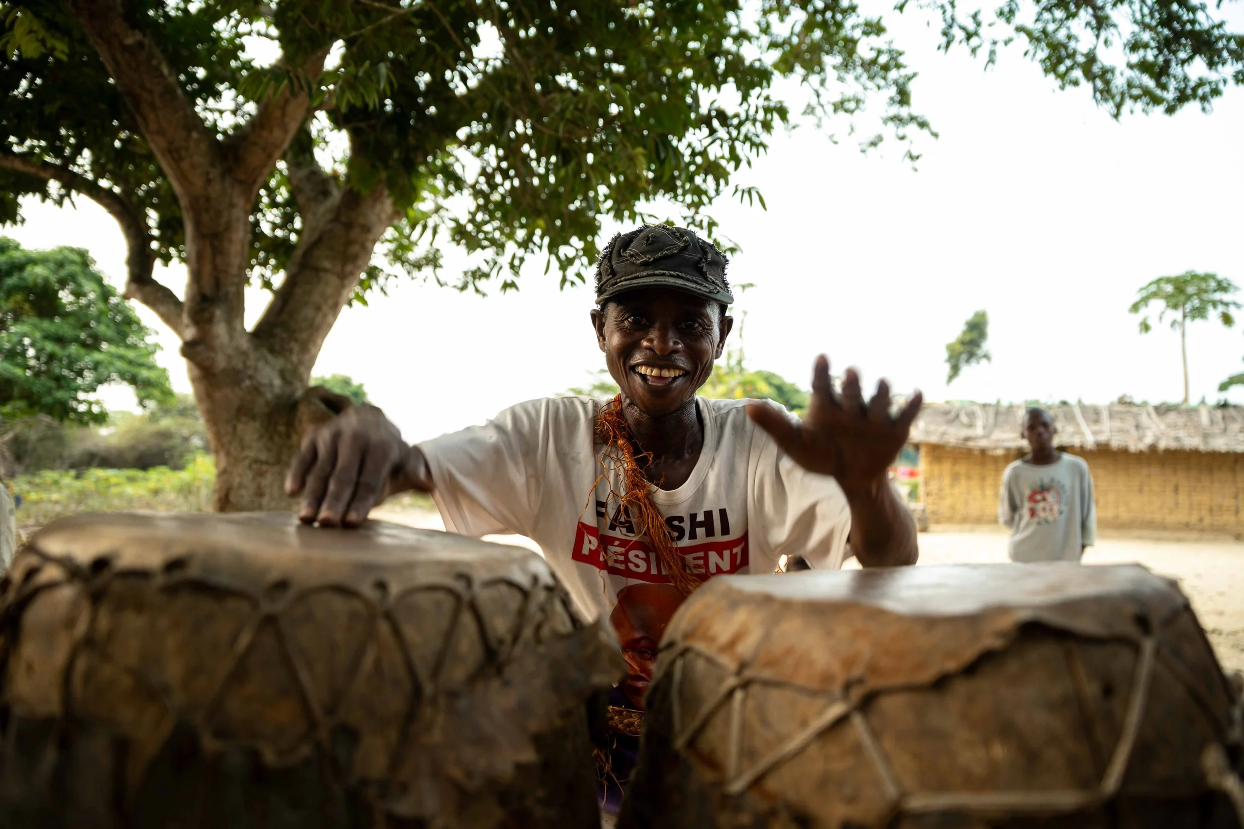 A drummer plays during a traditional dance ceremony organized for tourists, Mai-Ndombe, Democratic Republic of Congo, August 2025.