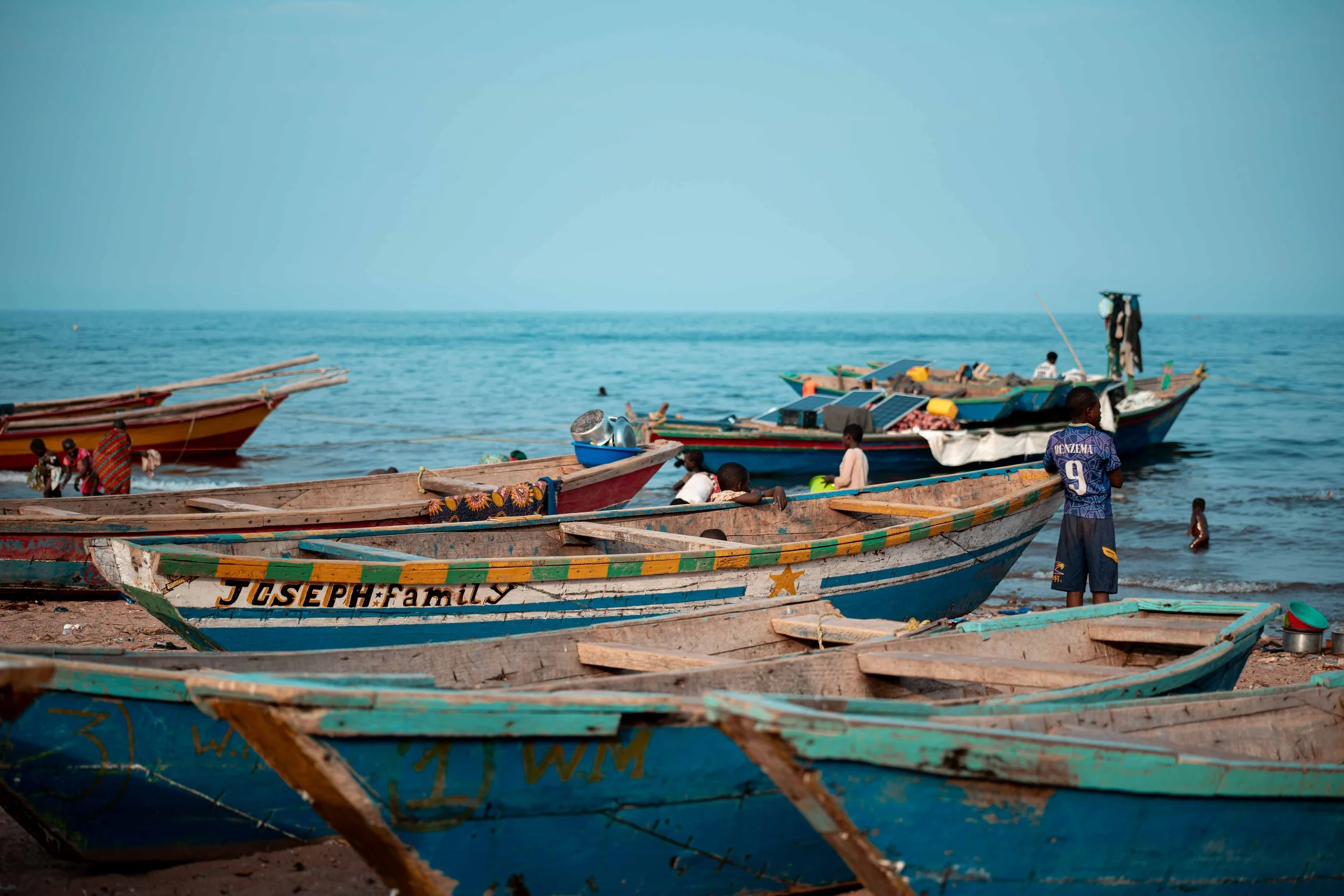 Daily life scene at Kamukolobondo beach, Kalemie, Tanganyika, DRC. 