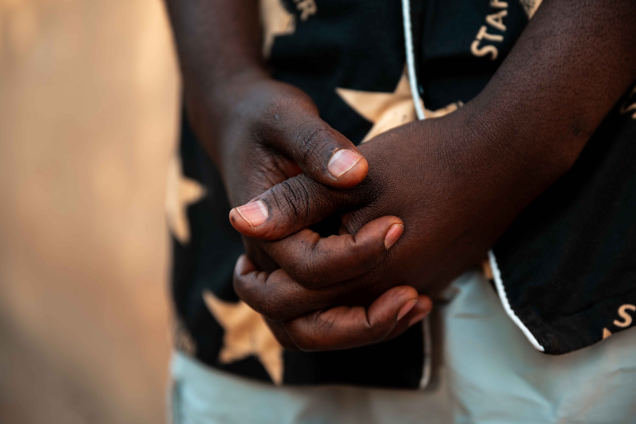 Portrait of a Manomapia resident employed by Tenke Fungurume Mining, who opposes relocation due to what he considers inadequate compensation. Fungurume, Lualaba Province, Democratic Republic of the Congo.