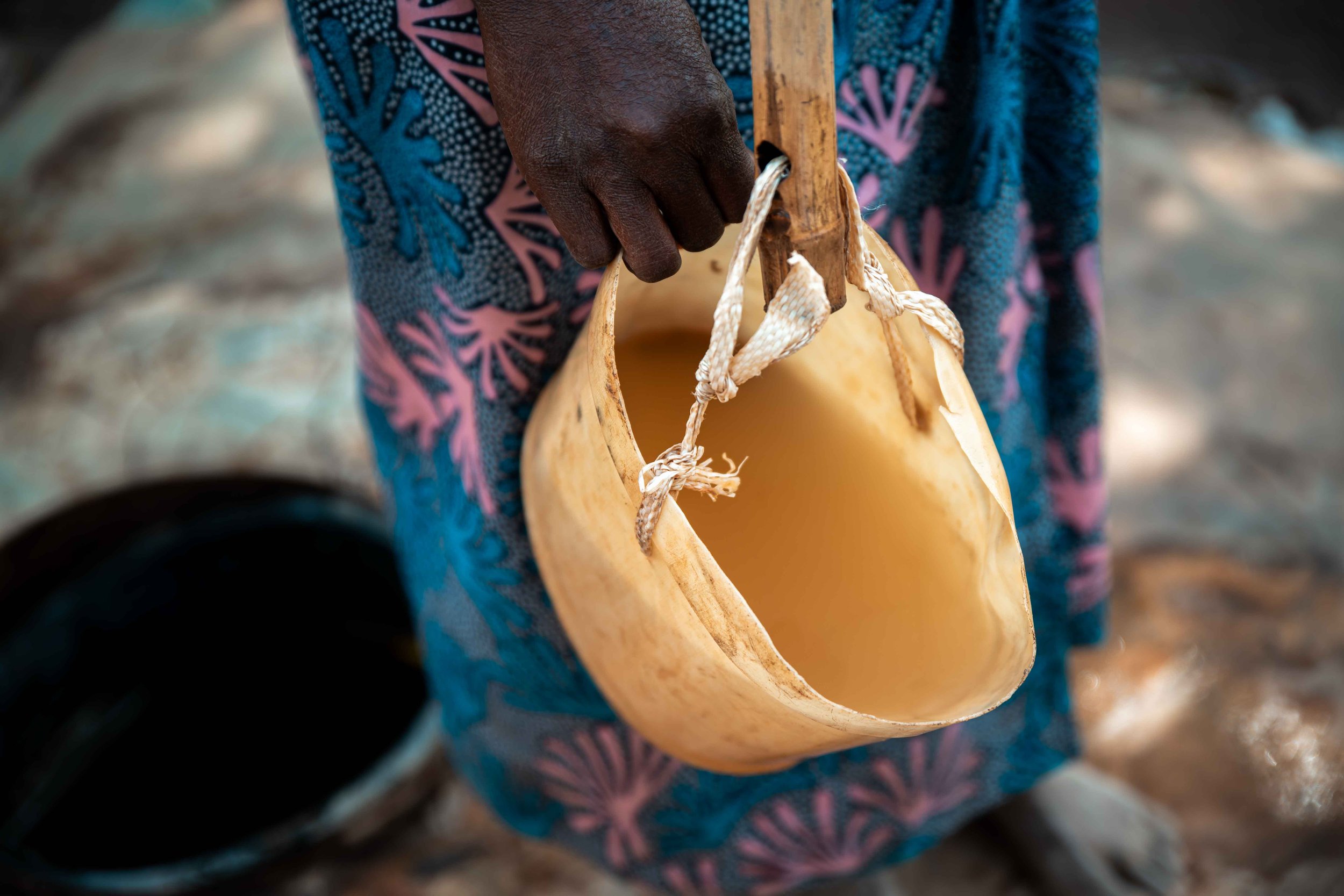 Close-up of water from an well in Manomapia. Once a source of drinking water, it is now contaminated due to toxic discharges. Fungurume, Lualaba Province, Democratic Republic of the Congo.