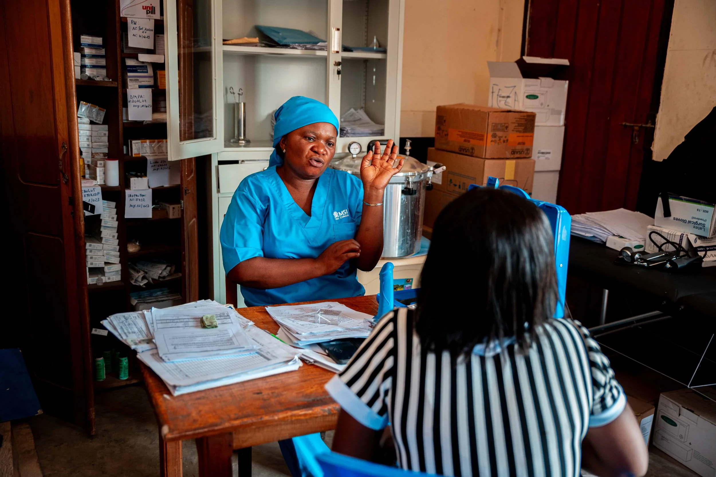 Anastasie Feza, MSI Lady, presenting MSI services at Kankomba Health Centre, Tanganyika, DRC. 