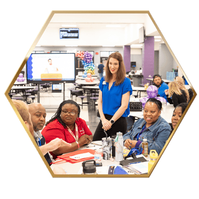 Kate listening to a group discuss the question during a workshop