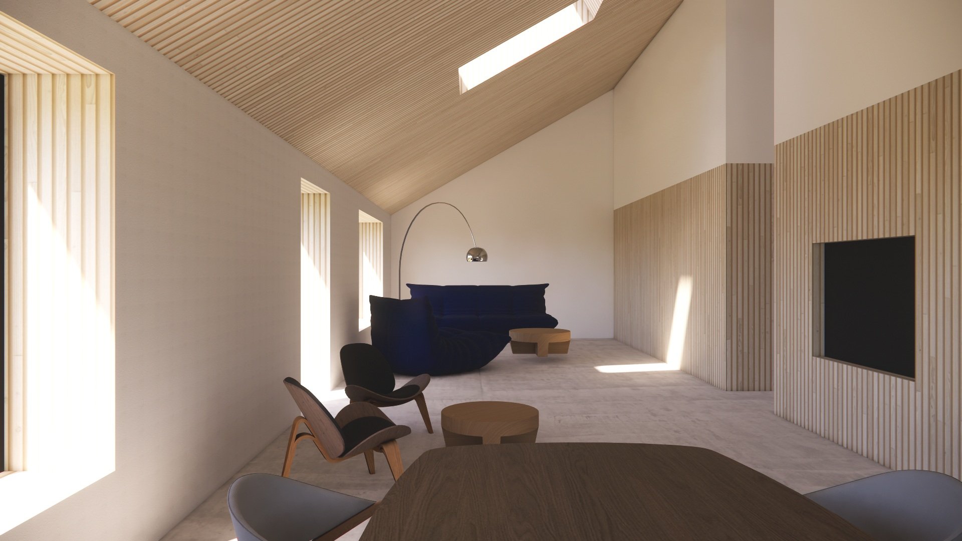 The interior lounge makes use of the west-facing windows and long-house aesthetic