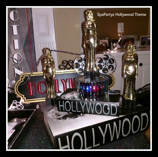 SpaPartyz Hollywood package table display with gold statues