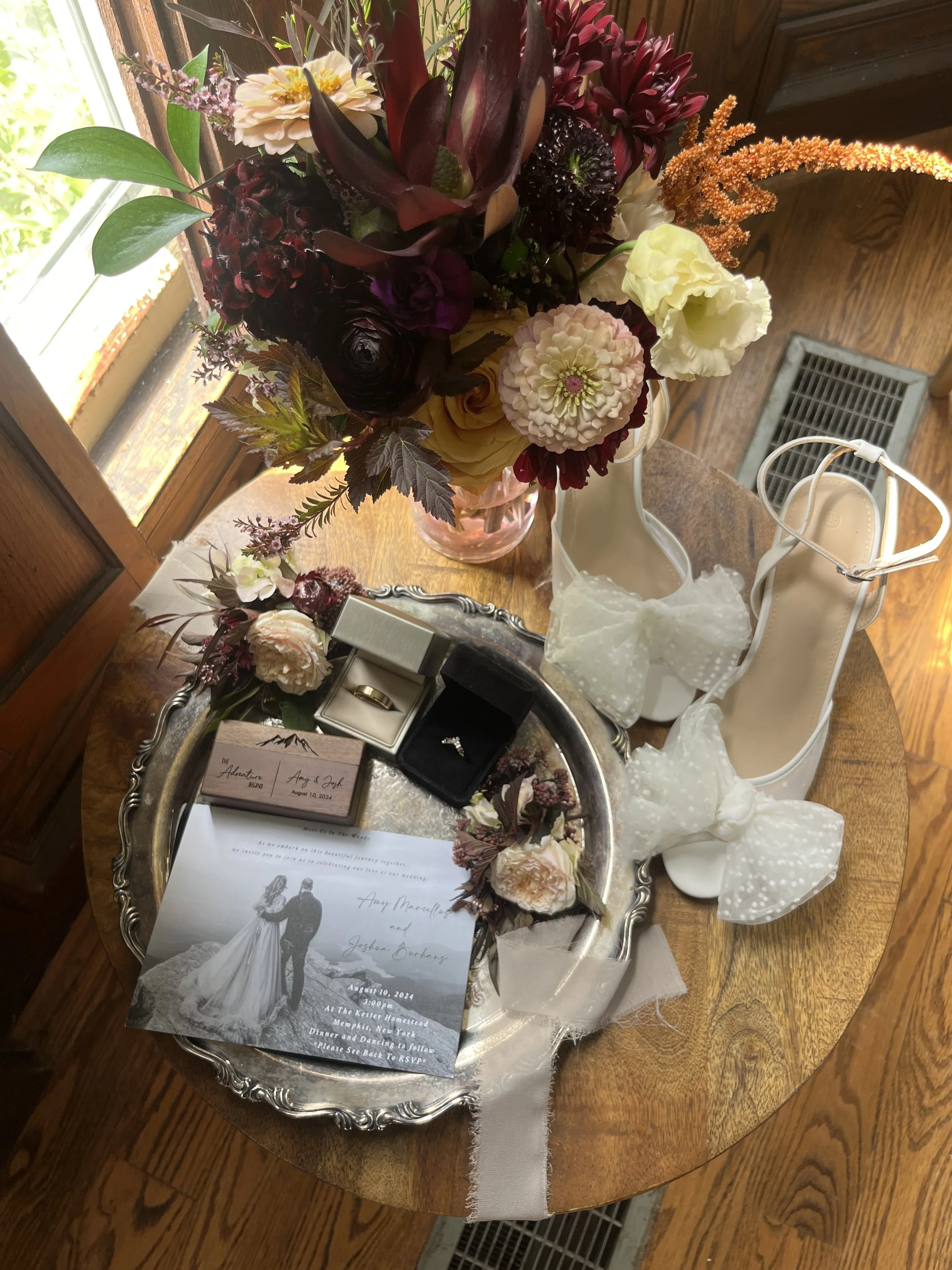 Wedding Flat Lay capture by Nick and Ashley Farrell - wedding videographers, Auburn NY