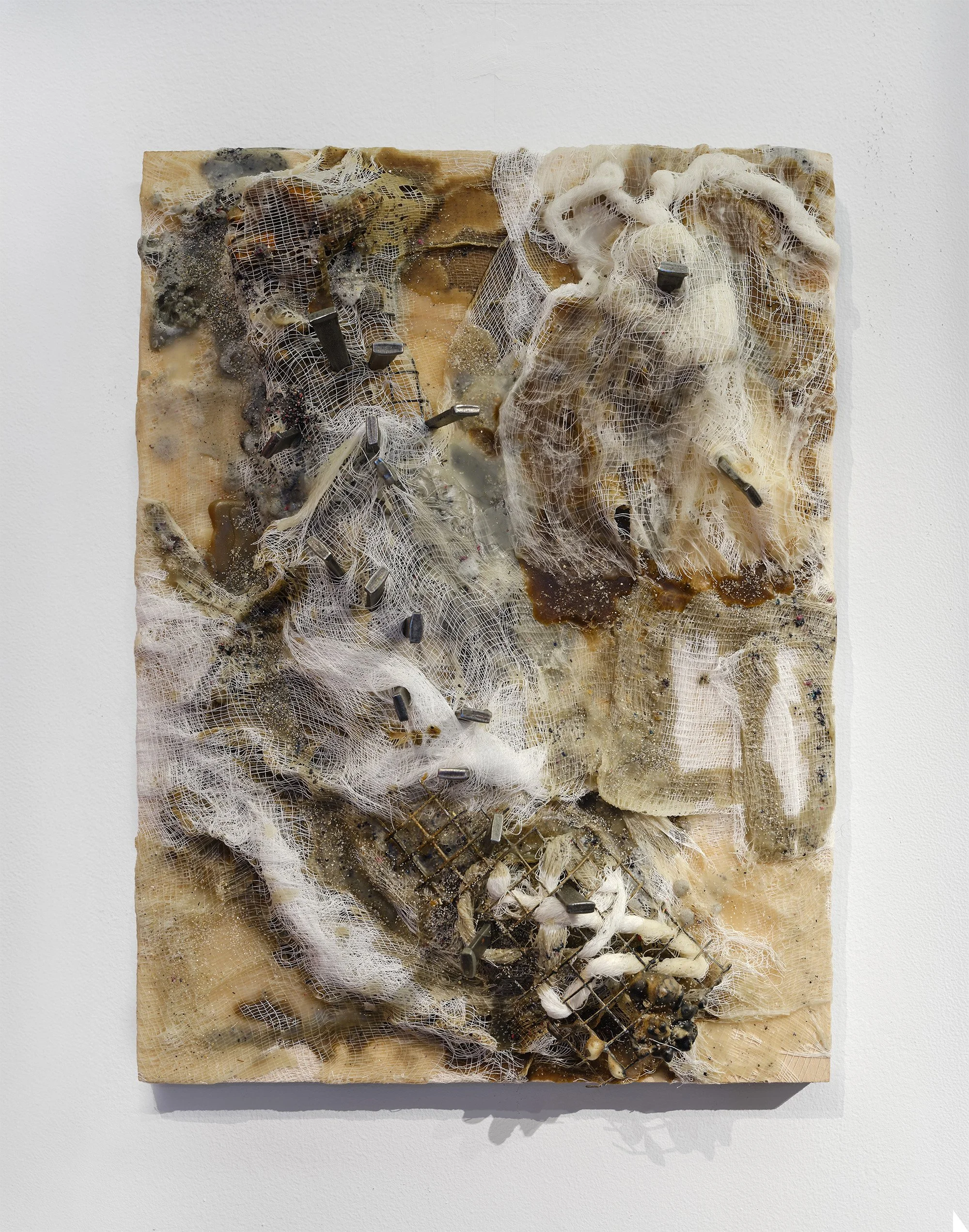 Open Weave No.1, 2024, Gauze, metal mesh, wax, sand, nails on wood panel, 16 x 12 x 3