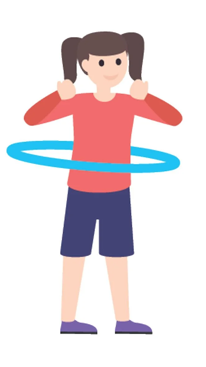 Young child using a hoola hoop