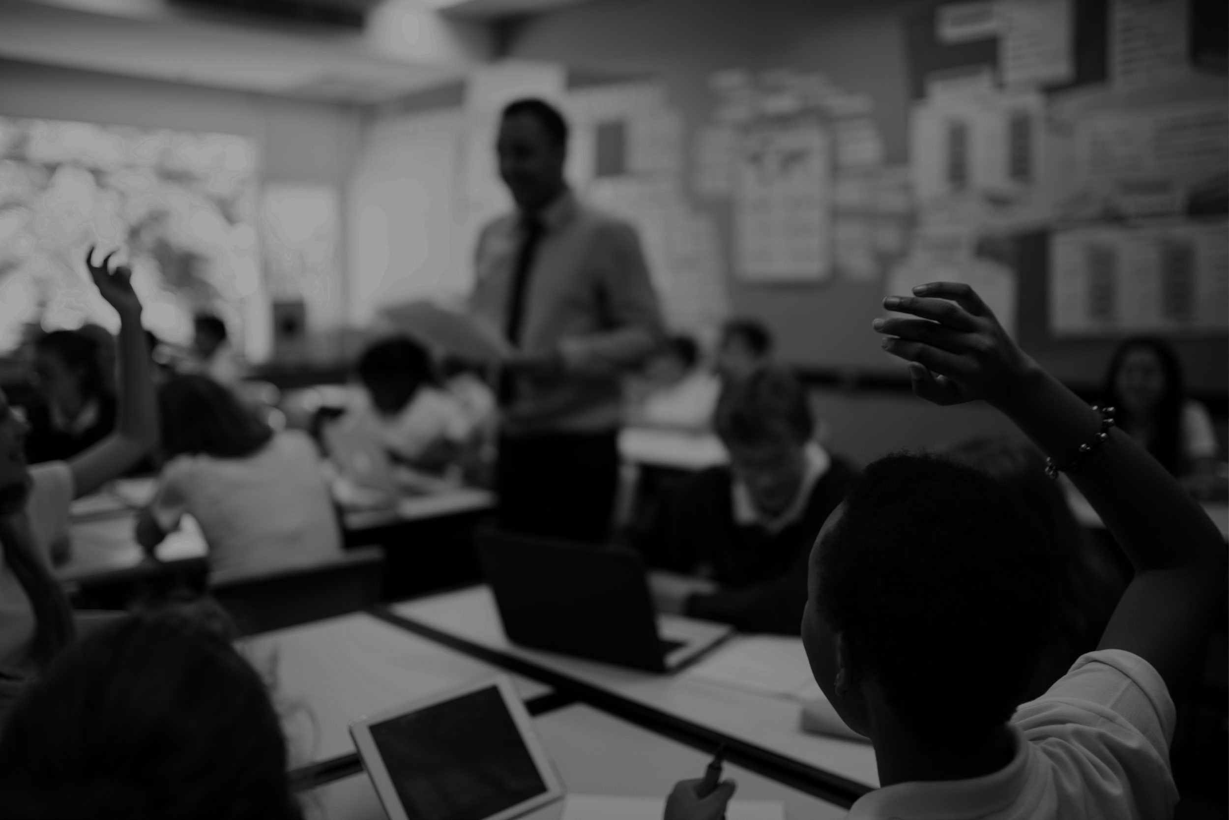 Black and white image of students in classroom