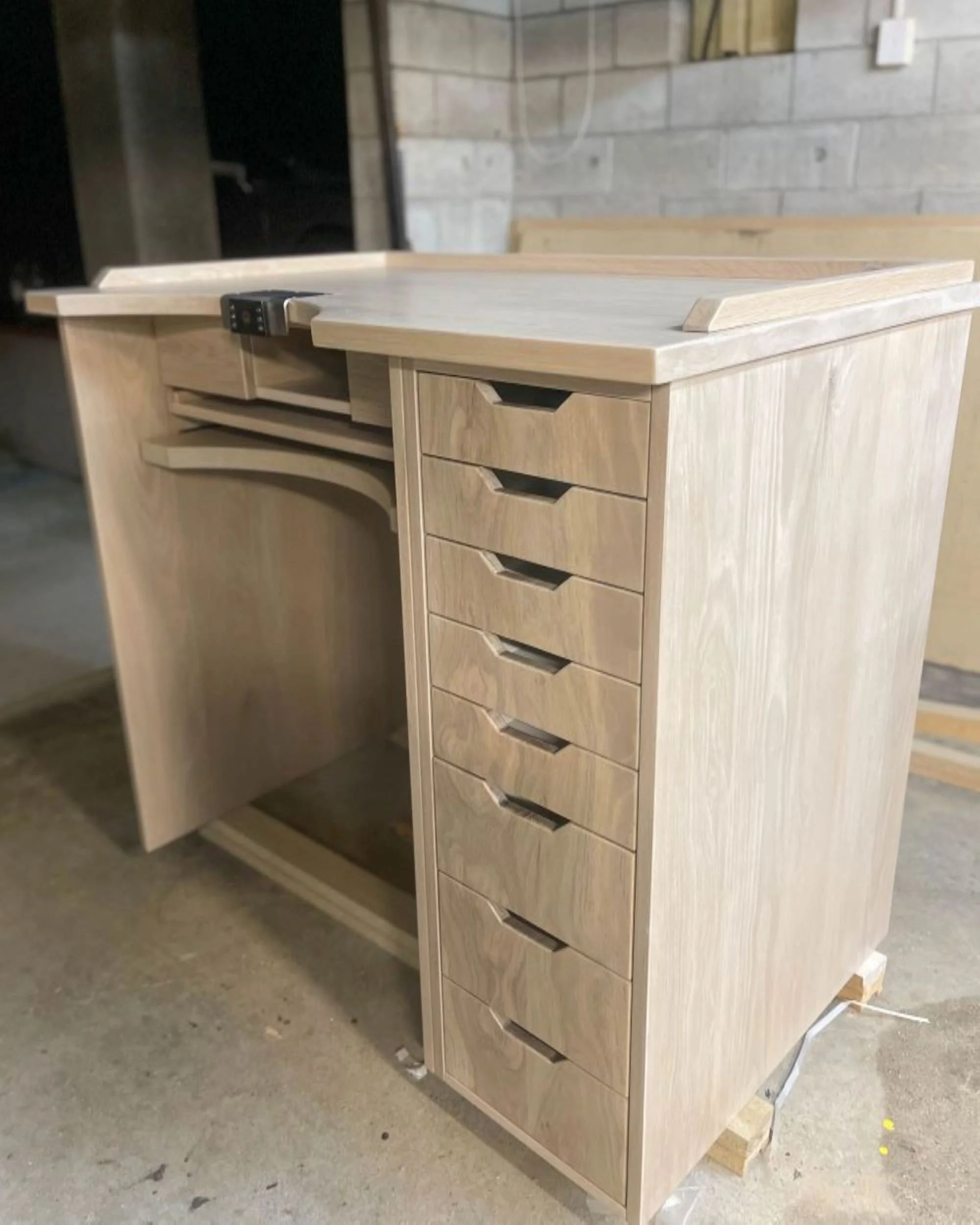 American oak jeweller's with cut outs at the tops of the drawers to act as handles
