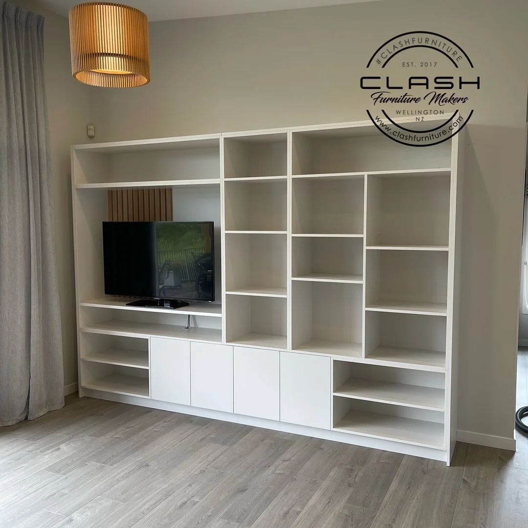 Wall Unit - The proportions of this unit fit quite well with the large lofted space . It&rsquo;s big enough to house everything , but not so big that it closes the space down. With push to open doors and a hint of solid oak accents behind the tv it a