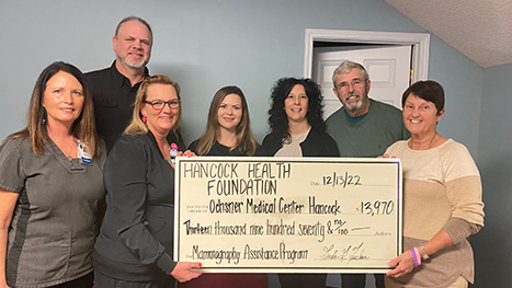 Linda Tucker and HHF Board members present a $13,970 check to the Ochsner Radiology Team.