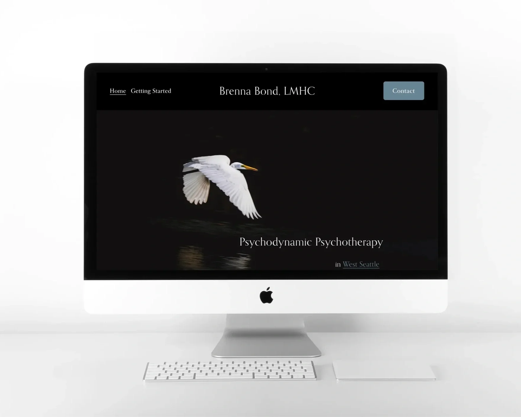 Computer screen displaying a website for "Brenna Bond, LMHC" with a white bird on a dark background, offering psychodynamic psychotherapy in West Seattle. The website has navigation links and a contact button.