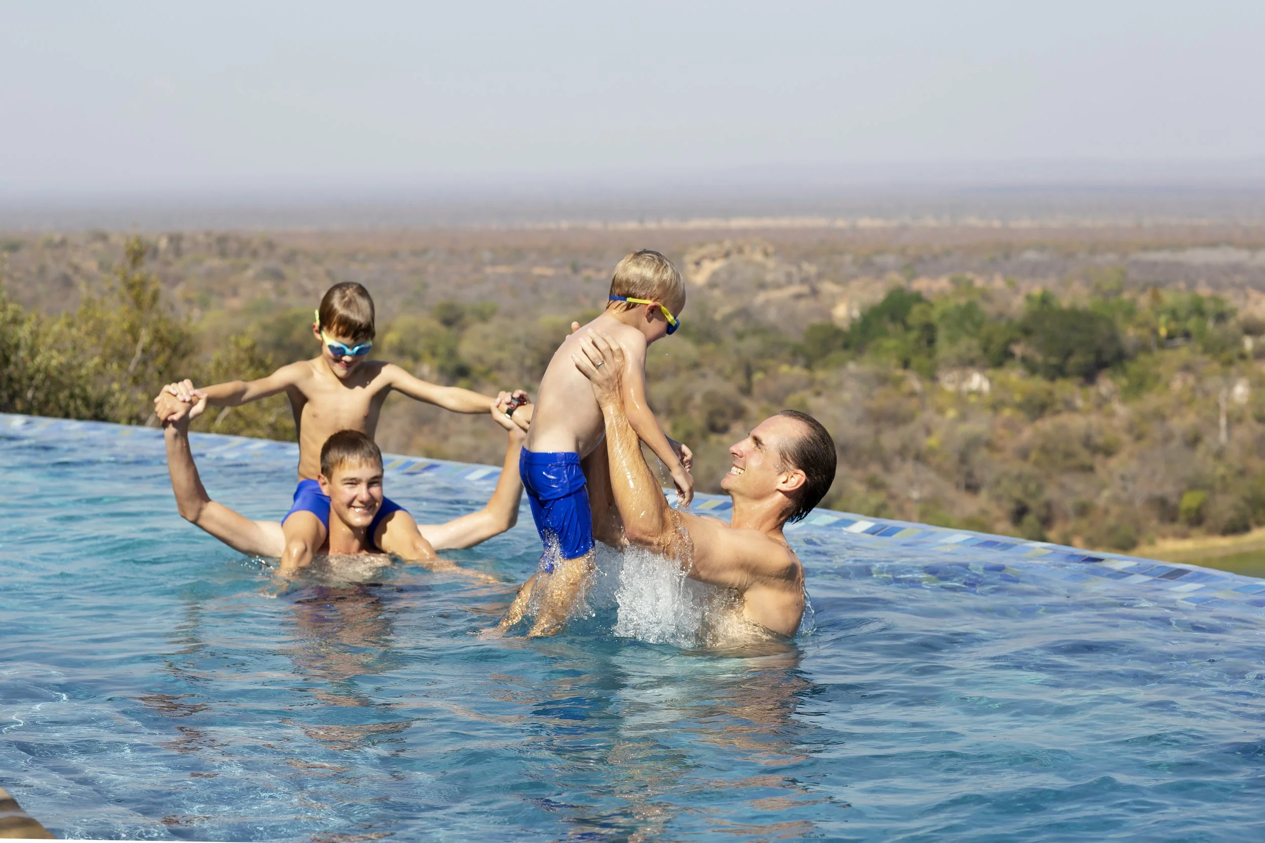 Singita Malilangwe_Family in the Pool.jpg
