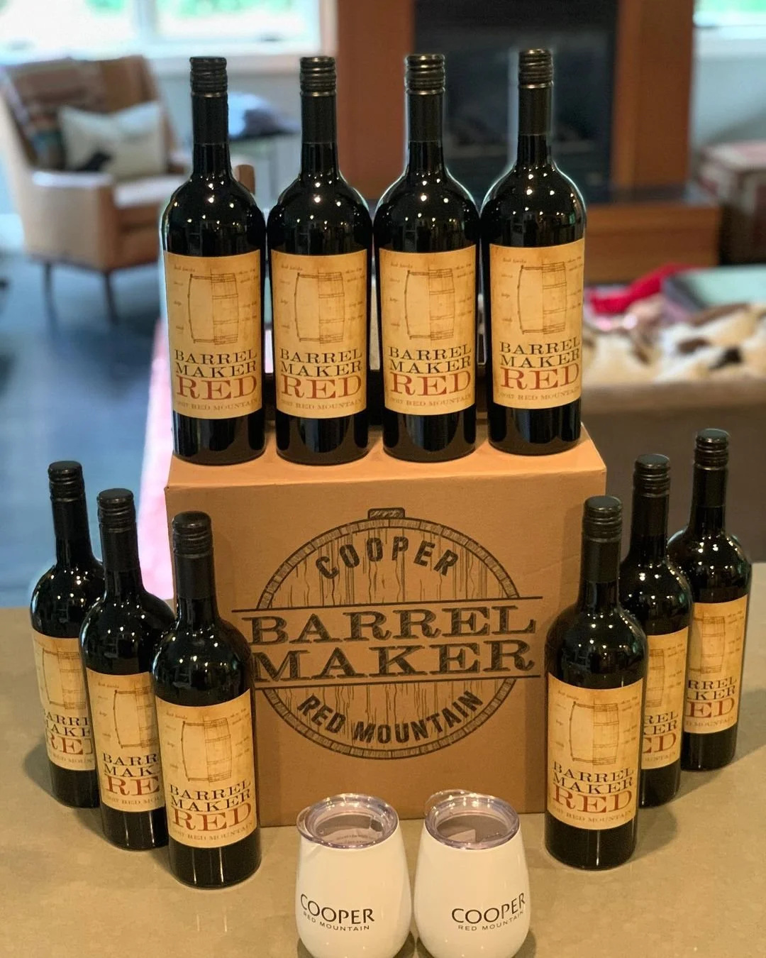 Bottles of Cooper Wine and stemless wine glasses