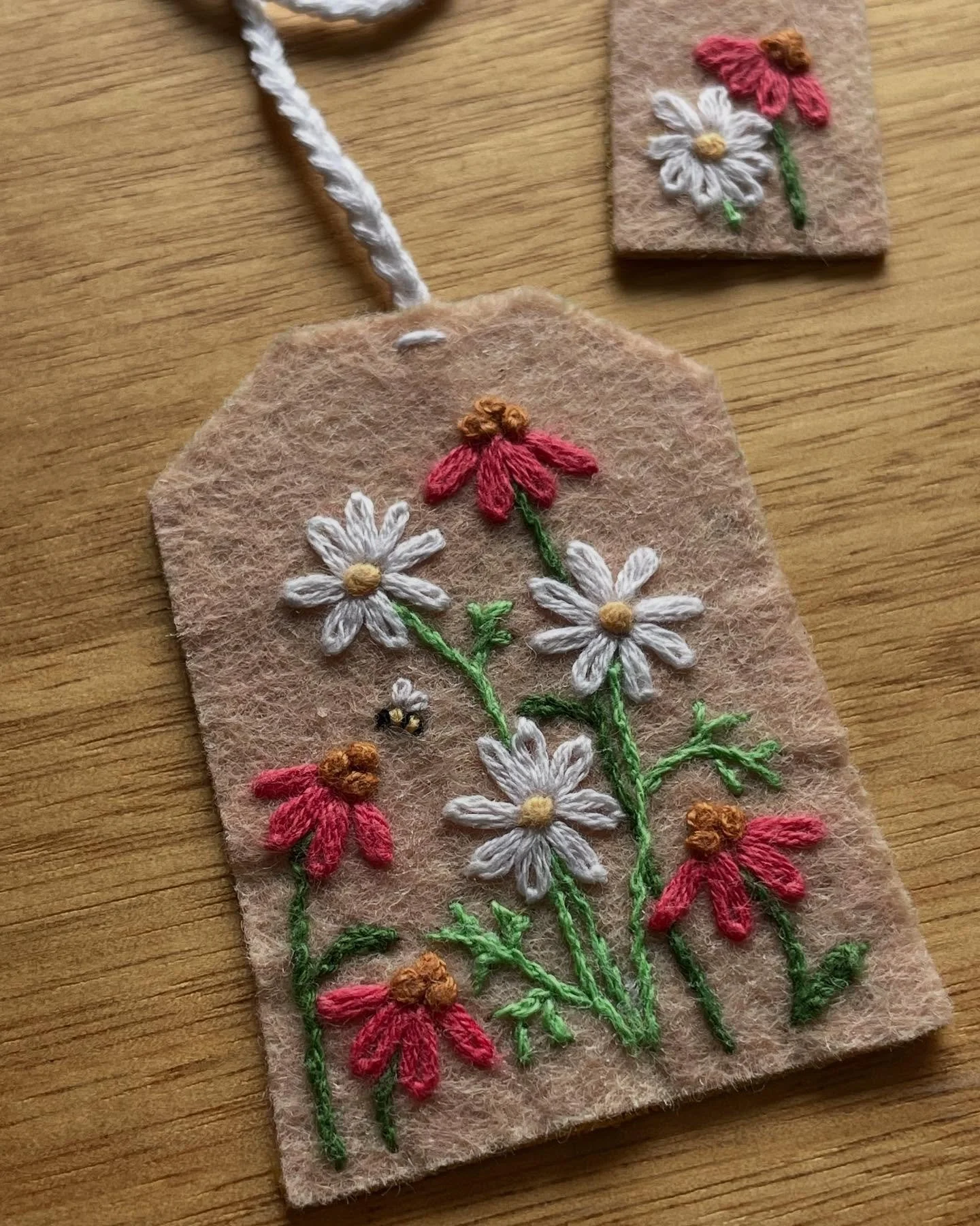 Chamomile &amp; Echinacea Bookmark 📖🌼🐝
A sweet little idea I found on Pinterest, with my own spin. In the spirit of slowing down, I carved out time each day to embroider this tiny beauty. I looked forward to the moment I could sit and just make so