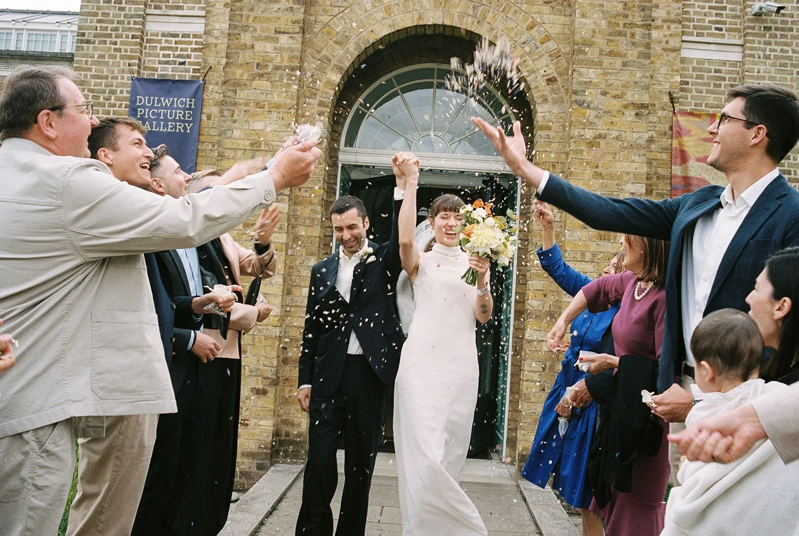 Bride and groom exit Dulwich Picture Gallery