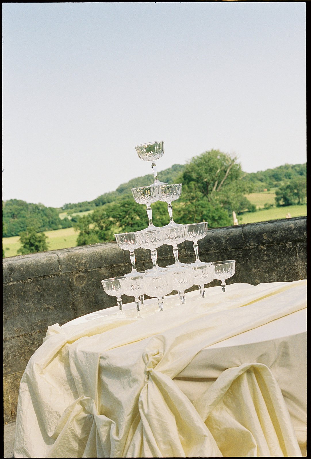 Champagne wedding tower at Chateau Neercane outdoor terrace