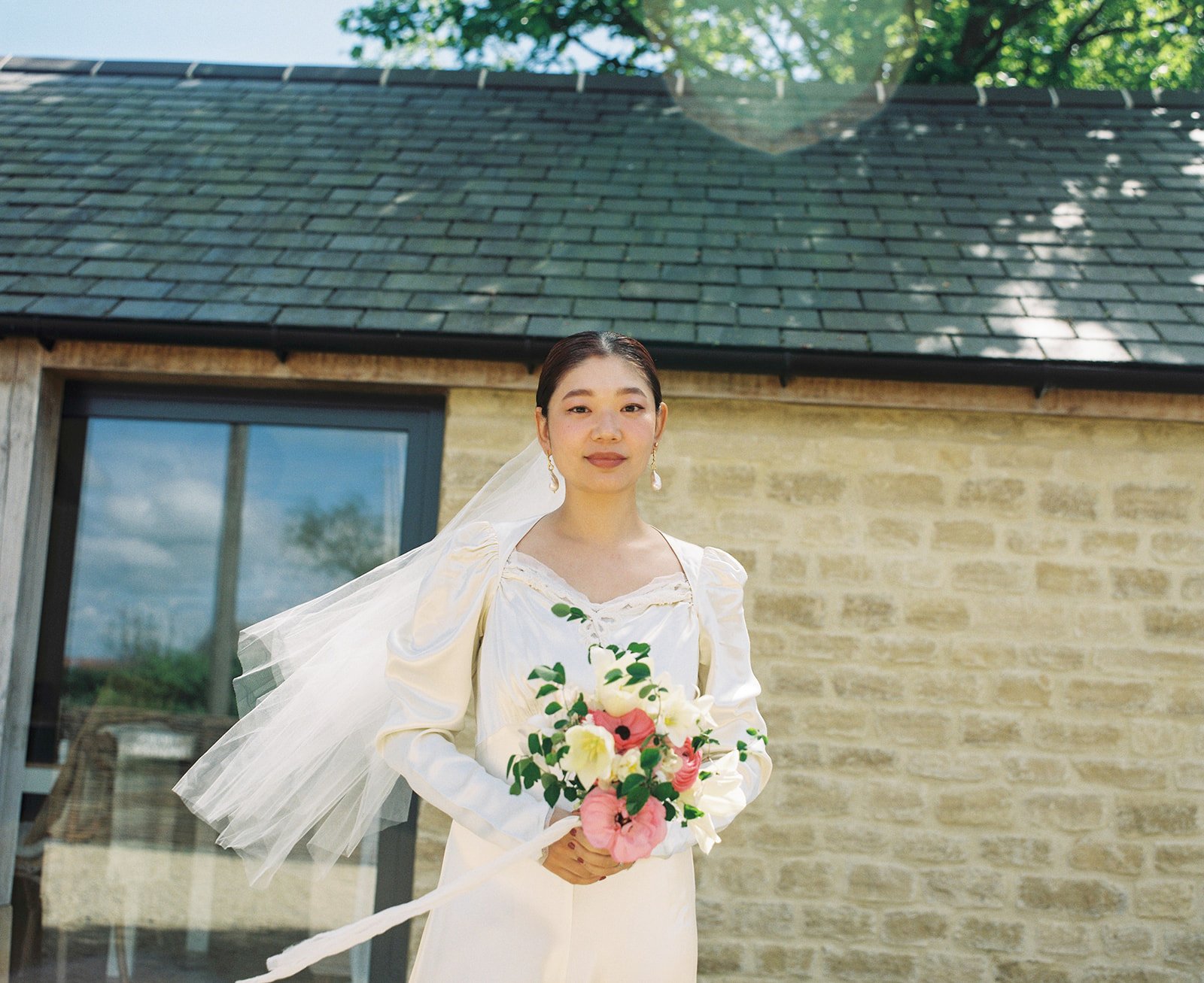 Medium format portrait of asian bride in France.