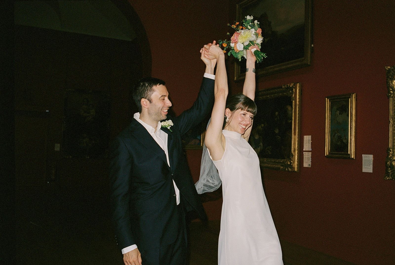Bride and groom celebrate at Dulwich picture Gallery.