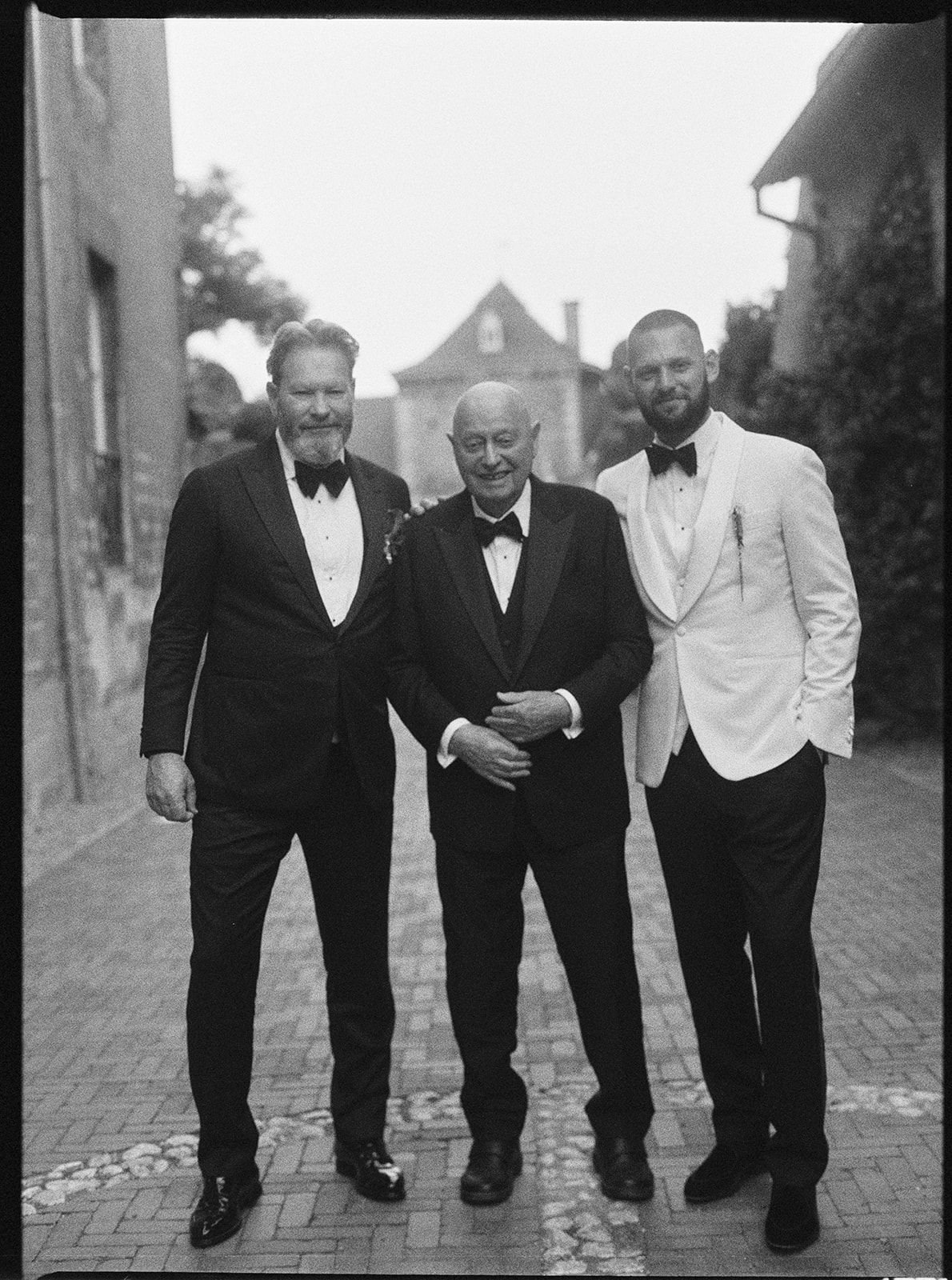 Groom and family portrait at Chateau Neercanne