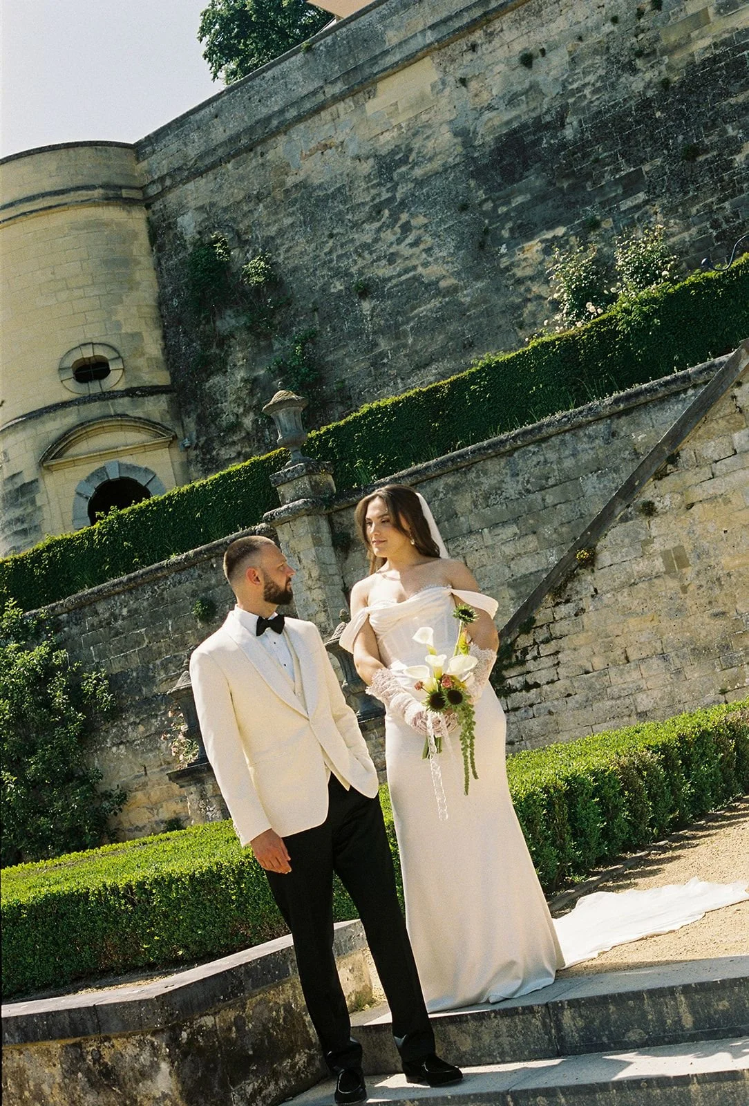 Bride and groom portrait at Baroque Gardens in Chateau Neercanne wedding