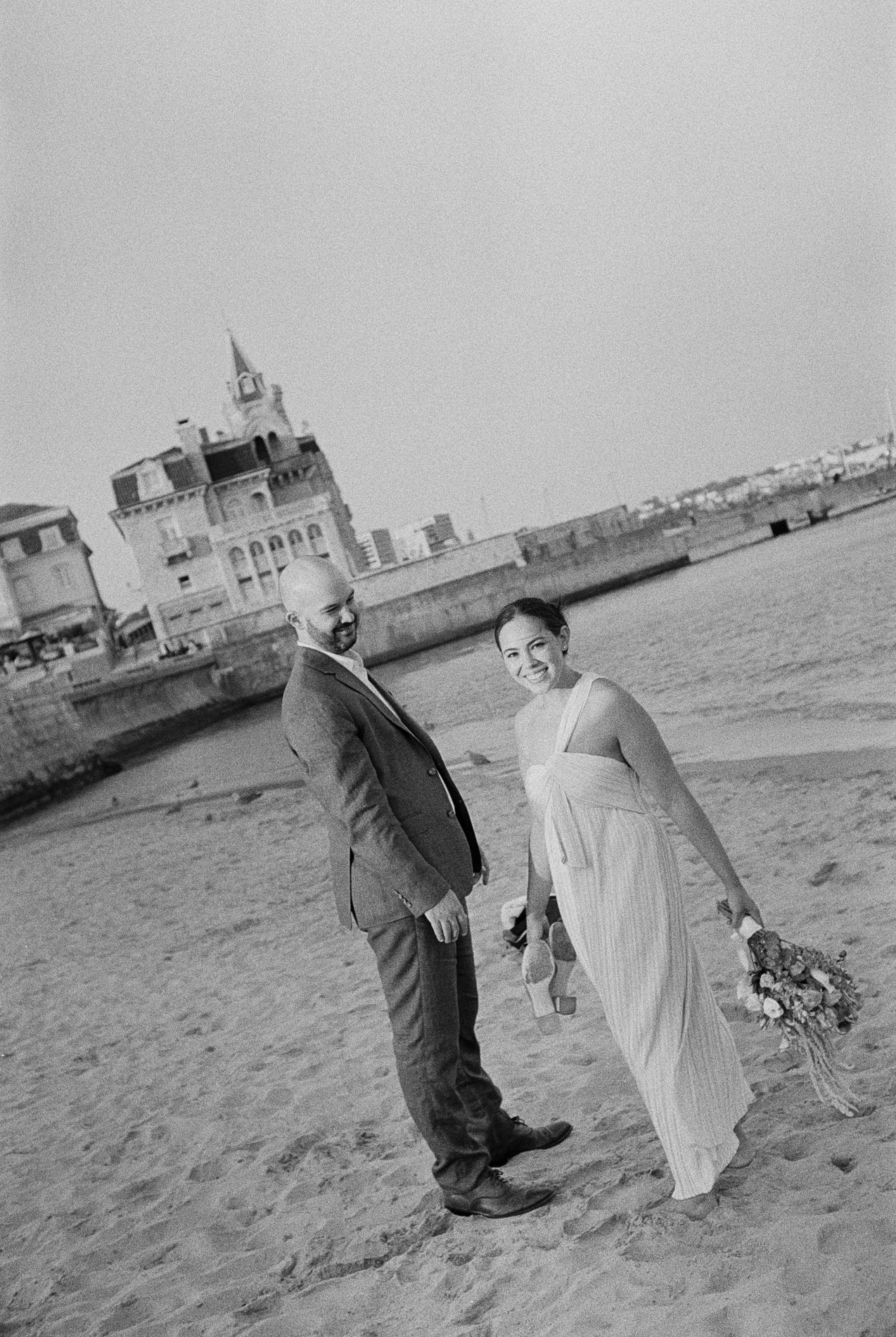 Couple smiling after vow exchange during their Lisbon elopement captured on film