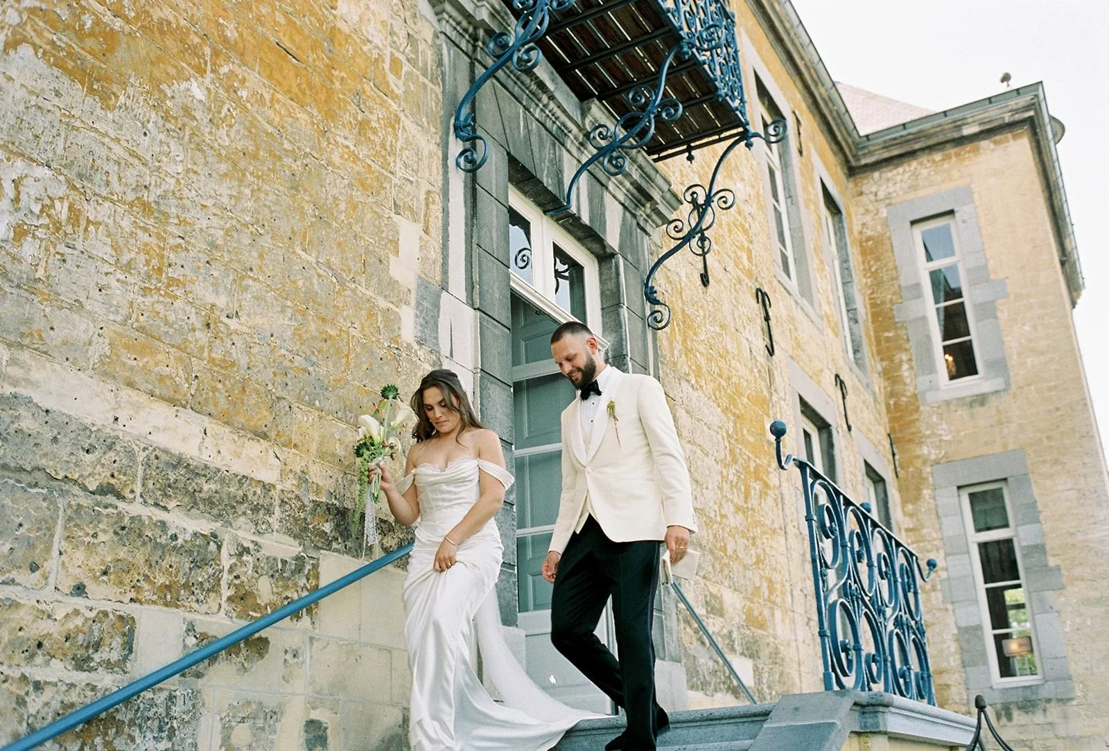 Bride and groom entering the Outdoor Terrace at Chateau Neercanne