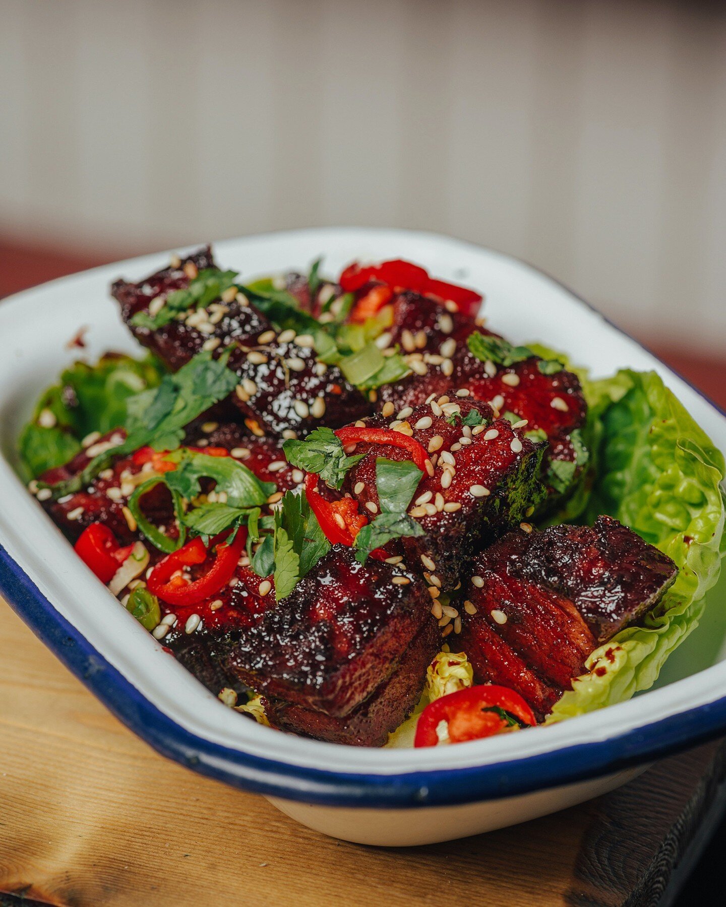 Some belly for ya belly? 😏 Soy and ginger marinated pork belly with chillis and sesame, a sticky addition to your TRIBAL order. 

Now available to order on the TRIBAL App! 📲

#TRIBAL